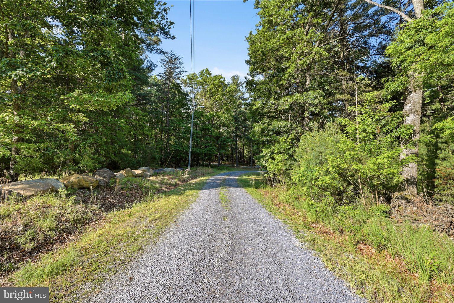 QUAKER WOODS - Land