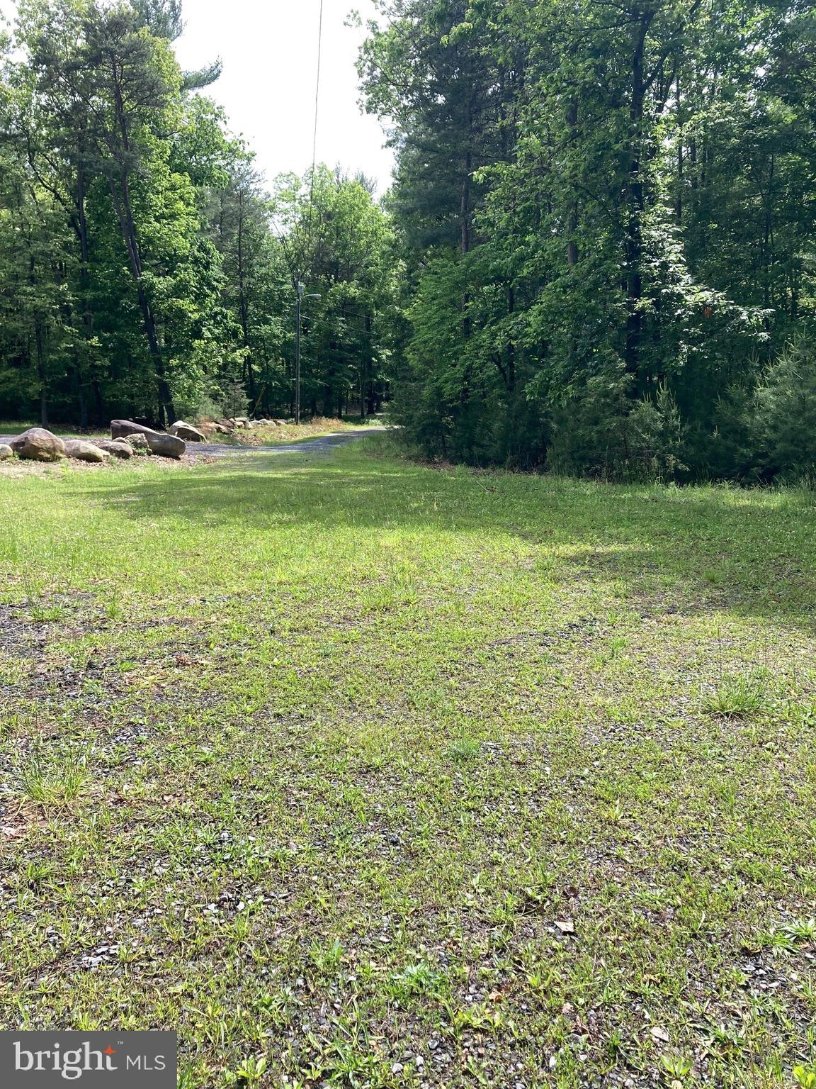 QUAKER WOODS - Land