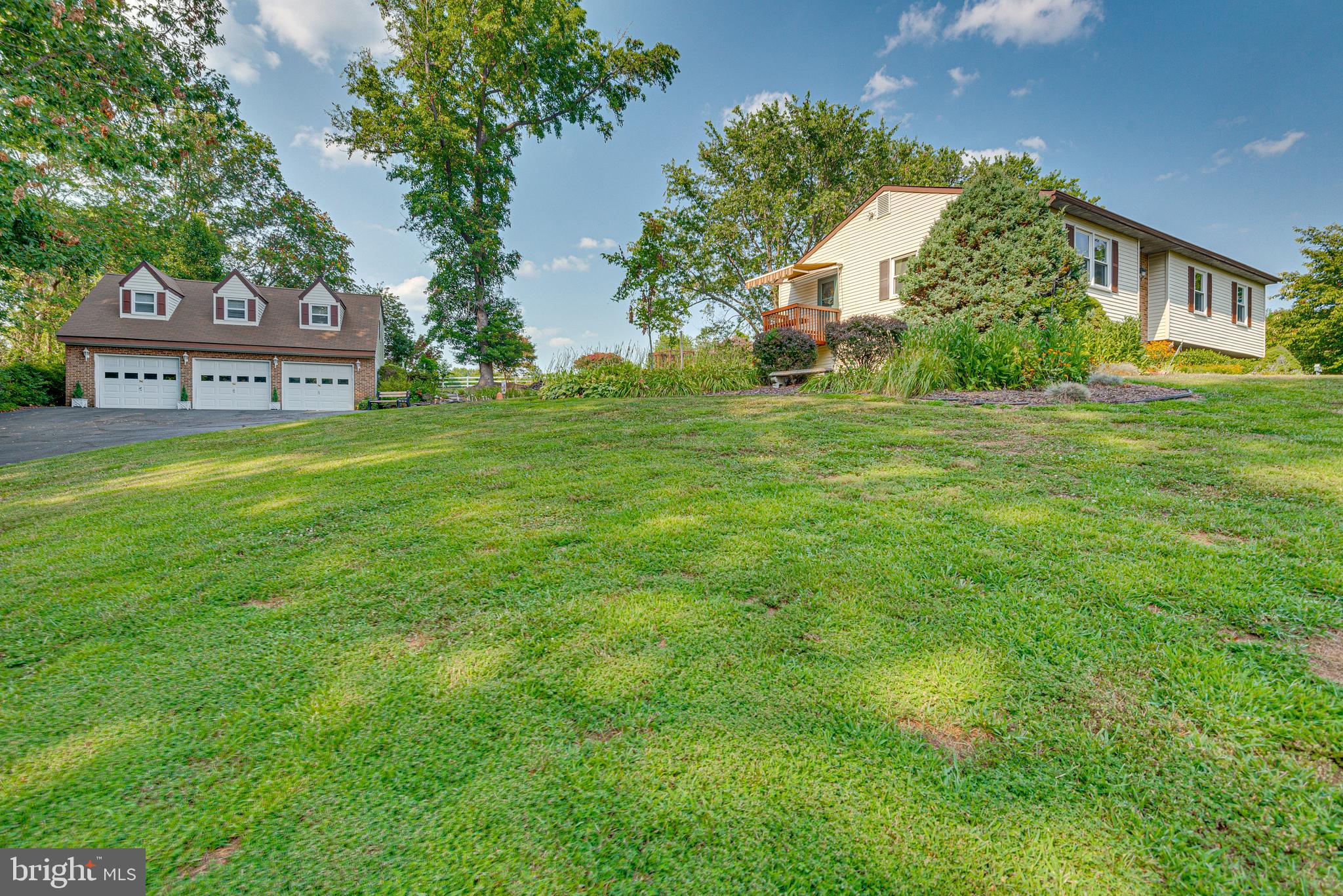 Multiple Offers in hand  .  Offer deadline 8/9 at 9 PM.   This is truly a must see to believe property.  Starting with 5.5 amazing acres  with a large barn and detached 3 car garage  with 840sqft  upper level apartment.   The main house offers 3000 sqft of living space with generous room sizes .  Light and bright lower level with walk out, 
Rough in for future bath  , Newly installed hot water heater and washer/dryer.   Included in the 5.5 acres is a separate lot  with separate tax id number.  The sellers have loved this home for 40 years now its your turn!