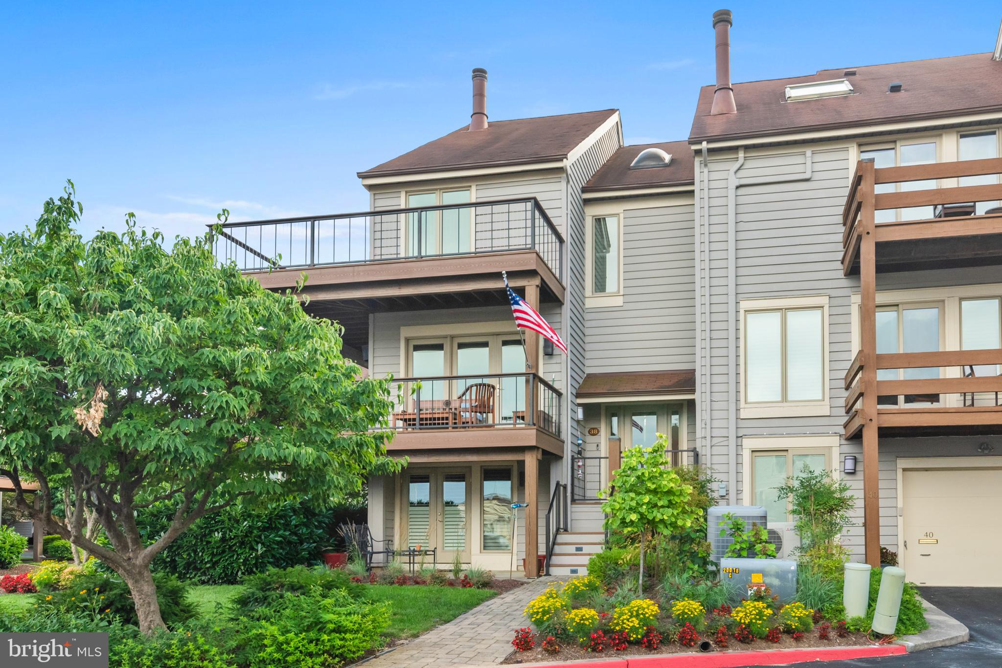 End Unit townhouse!! Enjoy views across the Severn River and also across Spa Creek to The Naval Academy from the expansive newly renovated decks on both the main level and bedroom levels.  The open floor plan is perfect for entertaining and lounging and helps to maximize the great location, natural light and privacy by allowing clear views on all three sides. 4 finished levels of living make it easy for spread out and have private, quiet space.  Large custom kitchen features great storage and work space and a  private deck off the breakfast room/kitchen for the most superb spot for grilling! Garage and driveway are out of sight and located in the back of the home increasing the appeal of the front exterior. Chesapeake Landing's location on the coveted Eastport peninsula is a easy stroll to dozens of fantastic restaurants, many marinas, several yacht clubs, shopping and Downtown Annapolis.  Pool, tennis and marina are privately held (which helps to keeping condo fees at a reasonable rate!) with membership and slips available and discounted for Chesapeake Landing Condo residents.