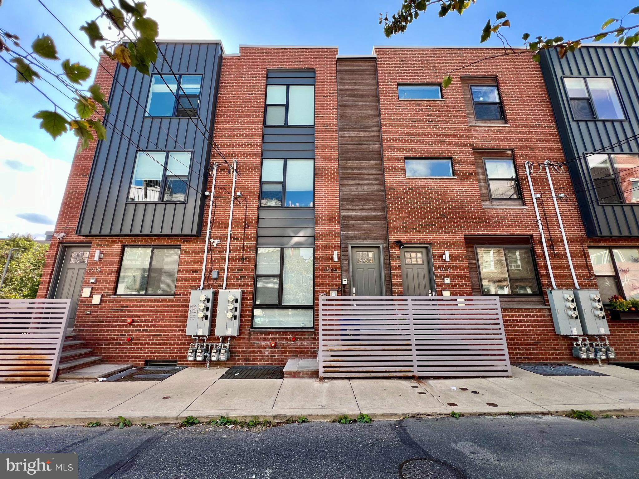 This 2-Bedroom/2-Bathroom Townhome is located in one of Philadelphia's hottest neighborhoods - East Kensington! Surrounded by tons of restaurants, shops, and entertainment, you will absolutely love this location. The proximity to Frankford Ave. makes it a breeze to get to some of Fishtown's greatest restaurants and bars. This stunning home is available NOW and ready for immediate move-in!

Enter the home and immediately fall in love with the hardwood flooring, tall ceilings, and large windows which allow tons of natural light to pour in and make the entire space feel incredibly open and bright.

The kitchen is a chef's dream and comes fully equipped with a stainless steel refrigerator, four-burner gas range, built-in microwave, and dishwasher. It has been designed with shaker-style cabinetry, quartz countertops, and a stone tile backsplash which adds the perfect pop of color and brings the entire design together.

Both bedrooms are spacious and can accommodate a queen-sized bed and complete bedroom set with ease. The primary bedroom includes an en-suite bathroom which is absolutely luxurious. Complete with stone tile flooring, modern vanity, and a shower stall with a custom tile surround, this bathroom truly feels like having a spa in your home! There is a second full bathroom in the hallway with a full-sized bathtub for added convenience.

In addition to all of the great features throughout the home, you will also love having your own parking space! Enjoy the convenience of having a parking spot directly behind your home and not needing to circle the block looking for a spot. A luxury that cannot be emphasized enough!

Tenants are responsible for electric, gas, water, and cable/internet in addition to rent each month. Pets permitted on a case-by-case basis with additional deposit!

Application Qualifications: Minimum monthly income 3 times the tenant’s portion of the monthly rent, acceptable rental history, acceptable credit history and acceptable criminal history. More specific information provided with the application.