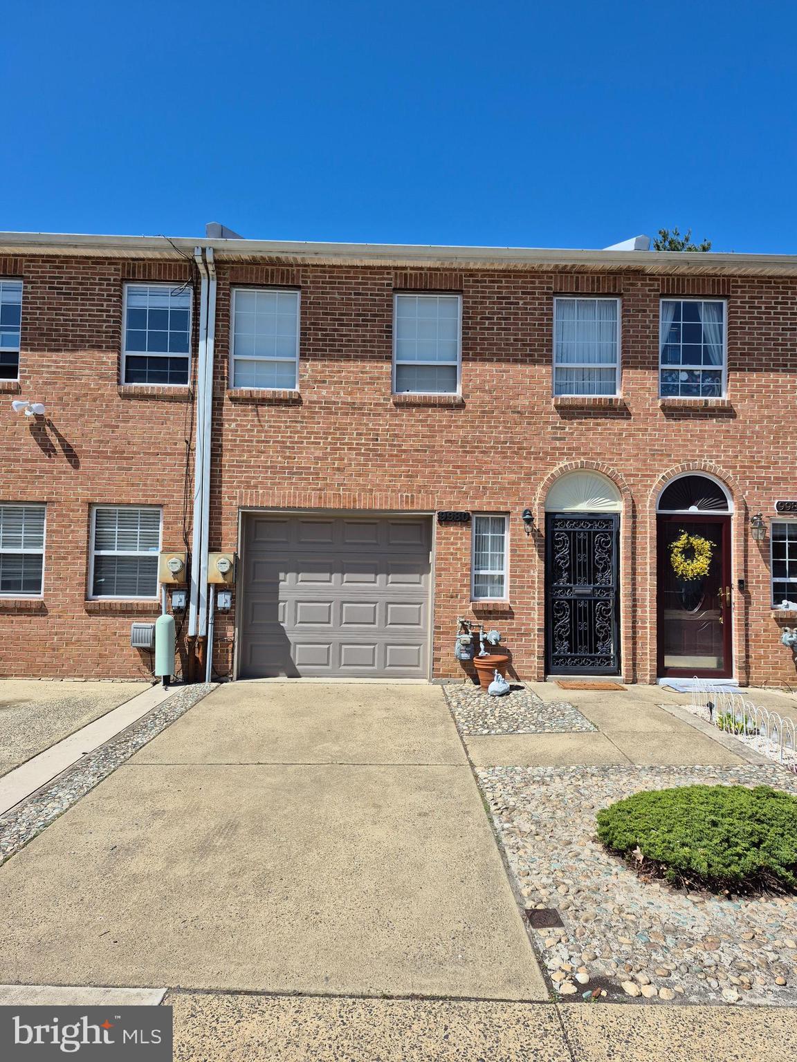 2 story row ranch or bi-level.  Upper level is the main level featuring living room, dining room, kitchen, full bath, master bedroom with walk-in closet.  Lower level or basement level is at ground level featuring entrance foyer, 2nd bedroom, full bath, laundry room, and family room with fireplace.  French doors from family room lead out to fenced-in backyard.  Also on this level is the one car garage with garage door opener.   This house is being sold by the original owner.  House is being sold in "as-is" condition.  House is in need of some updating and minor repairs.  But, definitely "priced to sell".