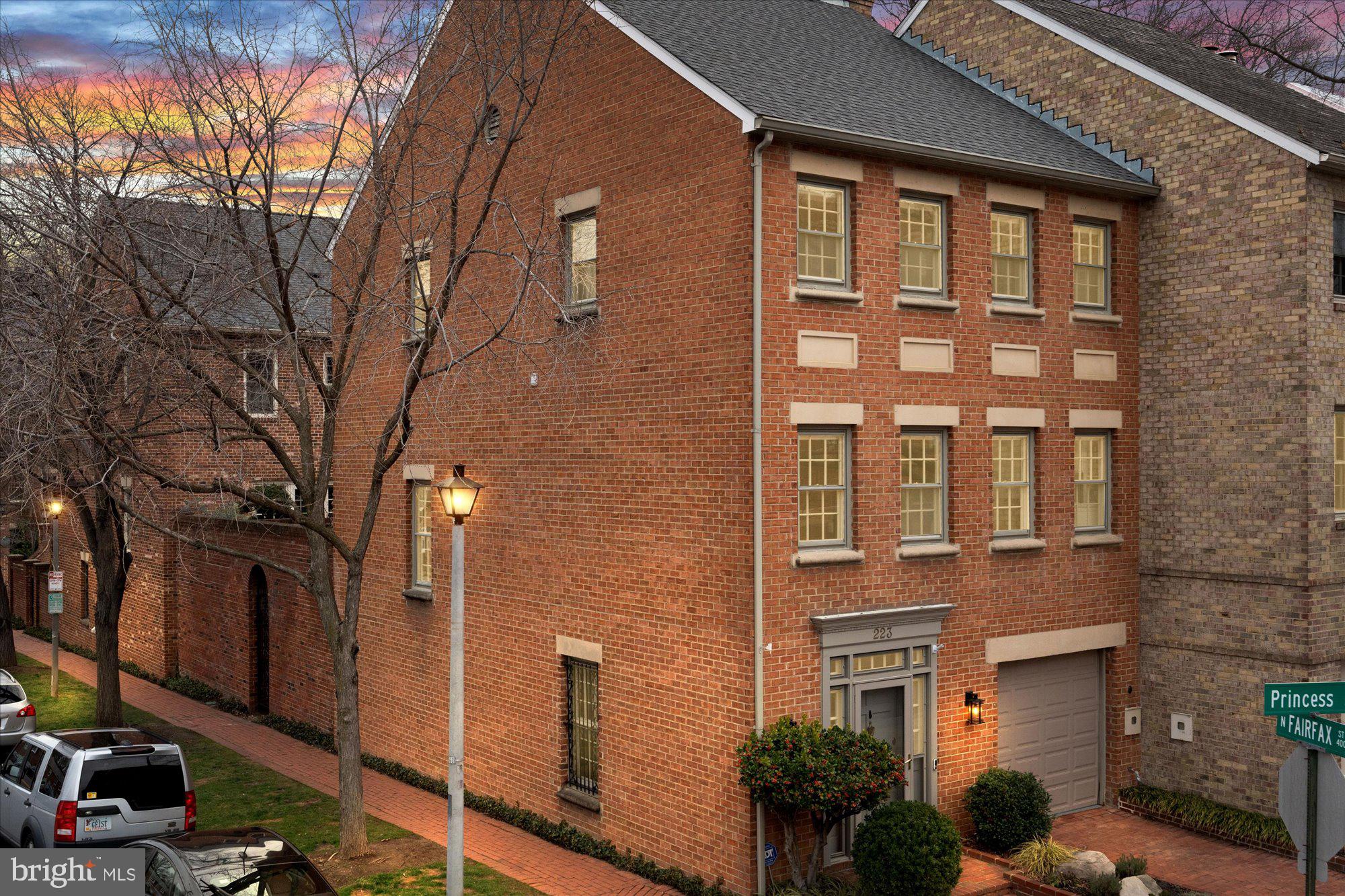 Welcome to a sophisticated blend of historic charm and contemporary luxury in the heart of Old Town, Alexandria! This captivating end townhome offers an exceptional living experience with its well-designed spaces and upscale features.

Step into the inviting living room, where the ambiance is set by built-in shelving and a warm gas fireplace, creating a cozy retreat for both relaxation and entertaining. The seamless connection to a charming flagstone patio expands the living space, providing an idyllic outdoor escape for gatherings or quiet moments.

The open floorplan concept effortlessly integrates the living room with the gourmet kitchen and dining area, fostering a sense of spaciousness and connectivity. The gourmet kitchen is a chef's delight, boasting a center island, custom cabinetry, and high-end stainless steel appliances. The main level is completed with a convenient half bath, adding a practical touch to this stylish home.

Ascend to the upper level, where the primary suite awaits with a spacious walk-in closet and a luxurious bath. Indulge in the serenity of the primary bath, featuring a shower and a double sink vanity, creating a private oasis of relaxation. Two additional bedrooms on this level provide flexibility for guest accommodations, a home office, or a cozy retreat. A well-appointed full bath ensures comfort for all.

The convenience of a one-car garage, coupled with an additional parking space, ensures parking is never a concern in the heart of Old Town. Beyond the confines of your elegant townhome, enjoy the exclusive amenities of the community, including a refreshing pool for sunny days and a tennis/pickleball court for those who love an active lifestyle.

Situated in the historic charm of Old Town Alexandria, this end townhome offers a perfect blend of timeless character and modern living. Immerse yourself in the rich culture and vibrant energy of one of the nation's most beloved historic districts. Don't miss the opportunity to call this exceptional property home!