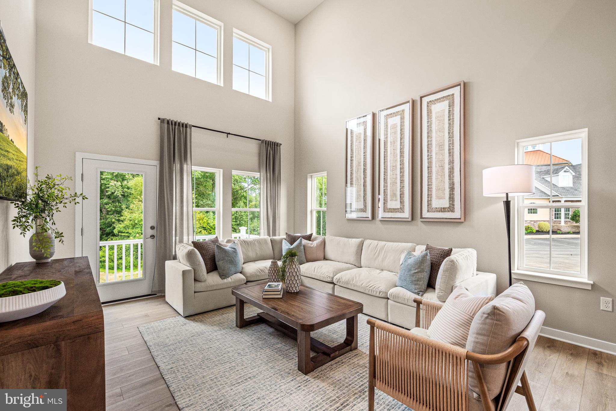 Move-in ready | First-Floor Living | Low-Maintenance Lifestyle. If you’ve been thinking about simplifying without giving anything up, this is a home you’ll want to see. Welcome to 560 Arrowgrass Lane—where comfort, convenience, and thoughtful design come together beautifully.

This Maverick townhome offers 3 bedrooms, 3.5 baths, and over 2,200 square feet of living space, giving you room to spread out while still enjoying the ease of a low-maintenance lifestyle.

The main level is bright and welcoming, with an open-concept layout that makes everyday living feel effortless. The kitchen is both stylish and functional, featuring soft-close cabinetry, Carrara white quartz countertops, a classic subway tile backsplash, and stainless steel appliances—all flowing seamlessly into the living and dining areas.

One of the most desirable features is the first-floor primary suite, offering a peaceful retreat with a tray ceiling, spacious walk-in closet, and a well-appointed en-suite bath—making single-level living easy and comfortable.

Upstairs, a loft, two additional bedrooms, and a full bath provide flexible space for visiting family, hobbies, or a quiet home office when you need it. There’s also finished storage space, so everything has its place.

Step outside to your composite deck, the perfect spot to enjoy your morning coffee or unwind in the evening.

At Riverbend, life is designed to be enjoyed. With lawn care, snow removal, and trash service included, you can spend less time on upkeep and more time doing what you love—all while being close to shopping, dining, and everyday conveniences.

Homes that offer this combination of main-level living, low maintenance, and flexible space for guests don’t come along often—especially with a June move-in.

Set in the heart of historic New Castle, Riverbend offers a low-maintenance lifestyle just minutes from the area’s best outdoor recreation. Stroll or bike along the scenic Battery Park Trail or the Jack A. Markell Trail, which connects to Wilmington’s vibrant riverfront. Explore quaint cobblestone streets lined with cafés and restaurants, all just moments from home.

Experience easy living, rich history, and modern comfort—all in one incredible 55+ community. Schedule your private tour today!

**Prices, dimensions, and features may vary and are subject to change. Photos are for illustrative purposes only. Please see sales team for final details and finishes. Taxes to be assessed after settlement. If using a Realtor, the agent's client must acknowledge on their first interaction with Lennar that they are being represented by a Realtor, and the Realtor must accompany their client on their first visit.**