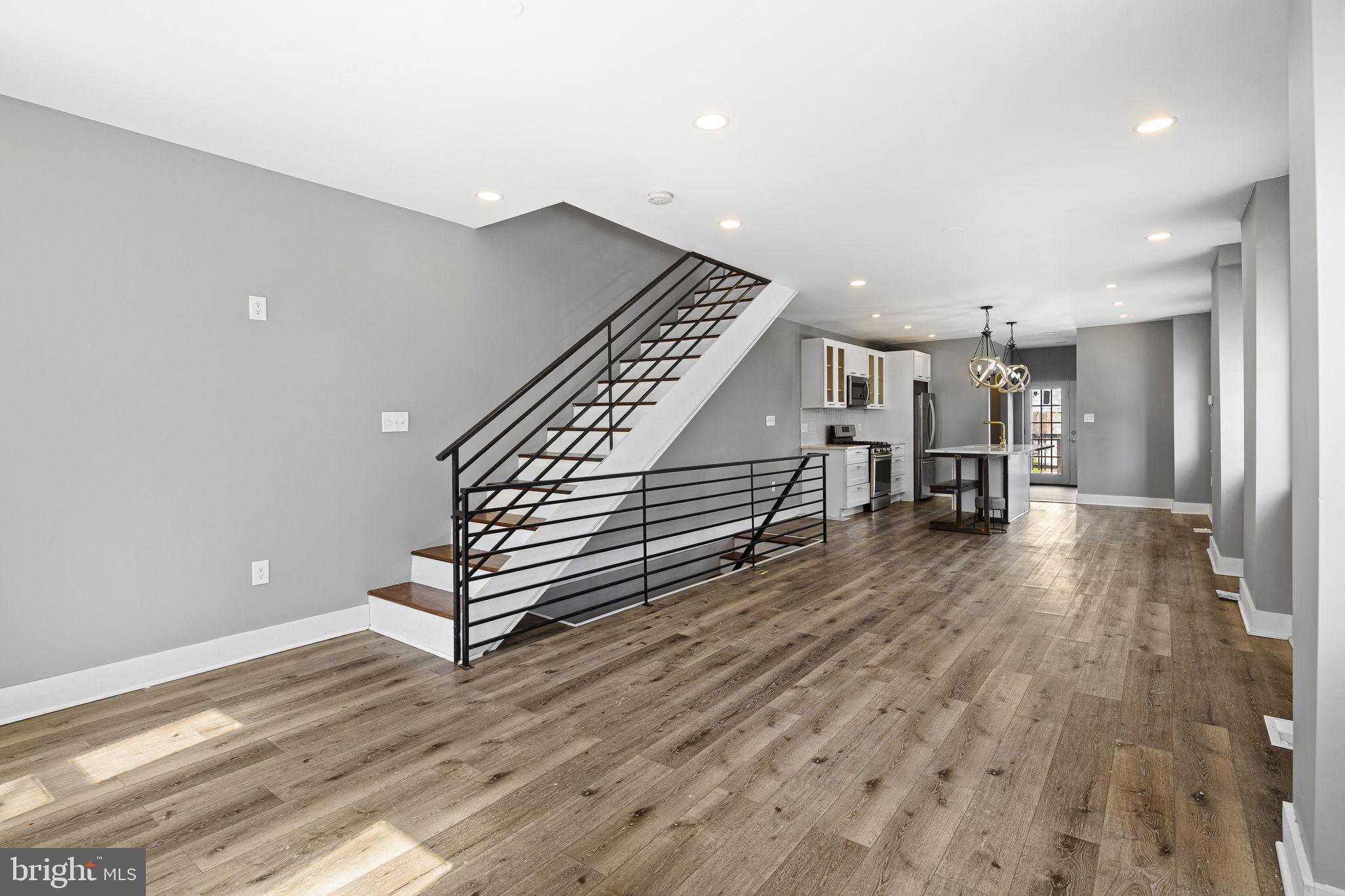 NEW PRICE. Welcome to 4626 E Thompson St — an updated 3 bed, 2.5 bath home sitting on a prime corner in the heart of Bridesburg.
From the moment you walk in, you’ll feel the difference. Wide open layout, tons of natural light, and a modern design that actually makes sense. The main level flows effortlessly from the living space into a stunning kitchen featuring quartz countertops, custom cabinetry, stainless steel appliances, and a large island perfect for everyday living and entertaining.
Upstairs, you’ll find three well-sized bedrooms with great closet space, including a spacious primary. The bathrooms are sharp and thoughtfully designed, with clean finishes and a double vanity setup that stands out. Convenient second-floor laundry makes day-to-day living easy.
The finished lower level gives you additional living space — perfect for a playroom, home gym, or second living area — plus plenty of storage in the utility section.
Out back, you’ve got a private yard with a deck and patio setup, giving you options for outdoor entertaining, relaxing, or making it your own. Rare corner positioning adds extra light and a more open feel compared to typical rowhomes.
Located in Bridesburg, you’re close to I-95, Center City, and everything Northeast Philly has to offer, while still getting that neighborhood feel.
