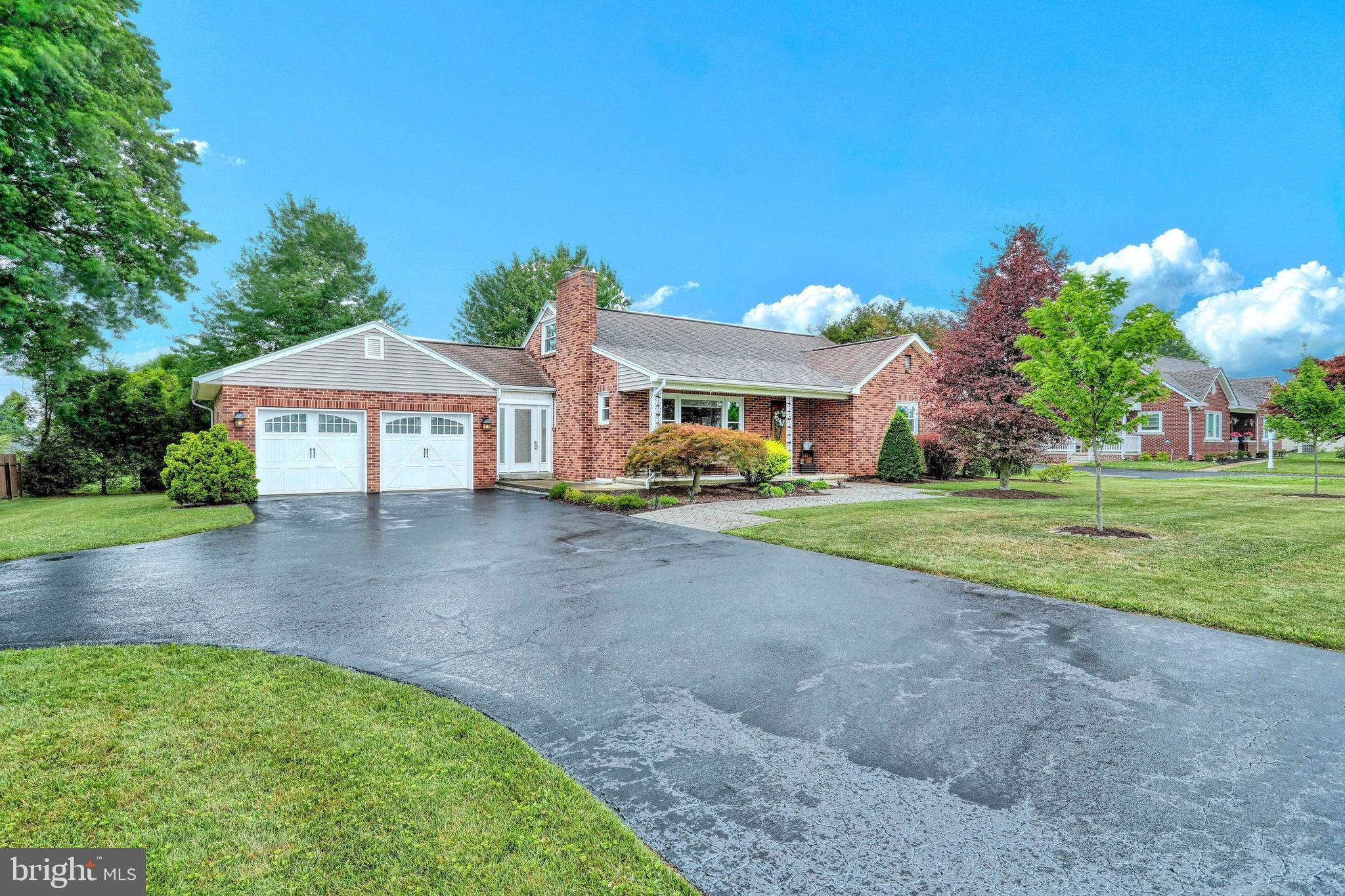 Your search will end here. Welcome home to a turn key ready all brick cape cod located in Dallastown Schools. Location is everything on this home that has been completely updated for your convenience.  Entry level bedrooms with hardwood floors and brand new carpet. Nice large living room with hardwood floors, gas fireplace, and plenty of natural light. Open kitchen has all new stainless steel appliances and opens right into the dining area. Upstairs bedroom or living space has brand new carpet, paint, and new very efficient wall unit. Large finished den with half bath has brand new carpet, new tile flooring, and paint.  Kick your shoes off at the breezeway that has brand new doors and tile floors. Oversized 2-car garage and large driveway gives you plenty of space for parking. Contact agent for a list of upgrades.