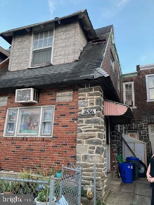 Attention all Contractors, Investors & handymen bring your imagination and check out this 3 bdrm, 1 bath row.  Some rooms need a little TLC.  Front patio is fenced in, side entry door leads into the enclosed front porch, living rm, dining rm and a spacious kitchen with maple cabinets.  The sink is located in the center island between the kitchen and dining room.   Upper level: 3 bdrms & 1 full bath.  Lower level: Basement and laundry.