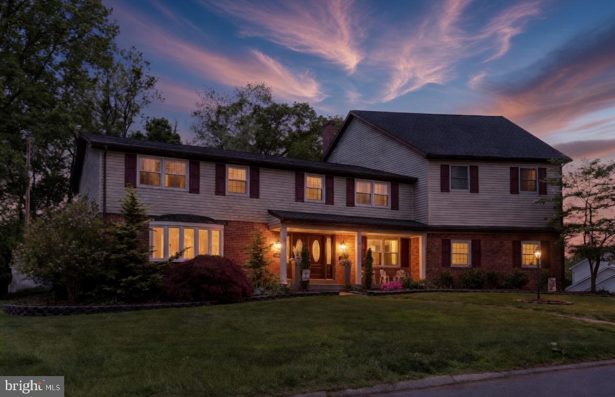 Experience unparalleled luxury in this masterfully redesigned 5 bedroom 4.5 bath home near the  West Shore Country Club. Upon entering, you are welcomed by a grand two-story foyer anchored by a sweeping curved staircase and an authentic Murano glass chandelier, flowing into the redesigned chef's kitchen that features a striking waterfall granite island, Thermador gas range, an oversized farmhouse sink, and a dedicated wine and coffee bar—complete with a wine refrigerator for the connoisseur.  Other standout features include solid oak flooring throughout the living room, dining room, and den, leading to a light- filled Great Room with vaulted ceilings, skylights and dramatic floor- to-ceiling brick fireplace. The main level continues with an expansive family room featuring a dry bar, sliding glass doors to the rear patio, and a second floor-to-ceiling brick fireplace. The luxury continues on the upper levels with an oversized primary suite featuring an award-winning Excel en suite a spa -like sanctuary boasting a freestanding soaking tub under the glow of a private chandelier. Equally impressive is the oversized secondary suite featuring walk-in closets and a designer en suite remodeled by Excel.  Another high point of the home is the third floor fitness studio a light- filled retreat featuring private access to the rear balcony and a convenient half bath. The exterior serves as a stunning showcase of curb appeal with  expertly designed and professionally cared for landscaping and integrated up-lighting.  Your own private retreat awaits in the backyard. The spacious brick patio provides plenty of room for lounging and dining, leading directly into the refreshing pool all within the privacy of your fully fenced yard. Lastly, there's space to grow in the partially finished basement, which offers abundant storage and flexible space for future expansion.