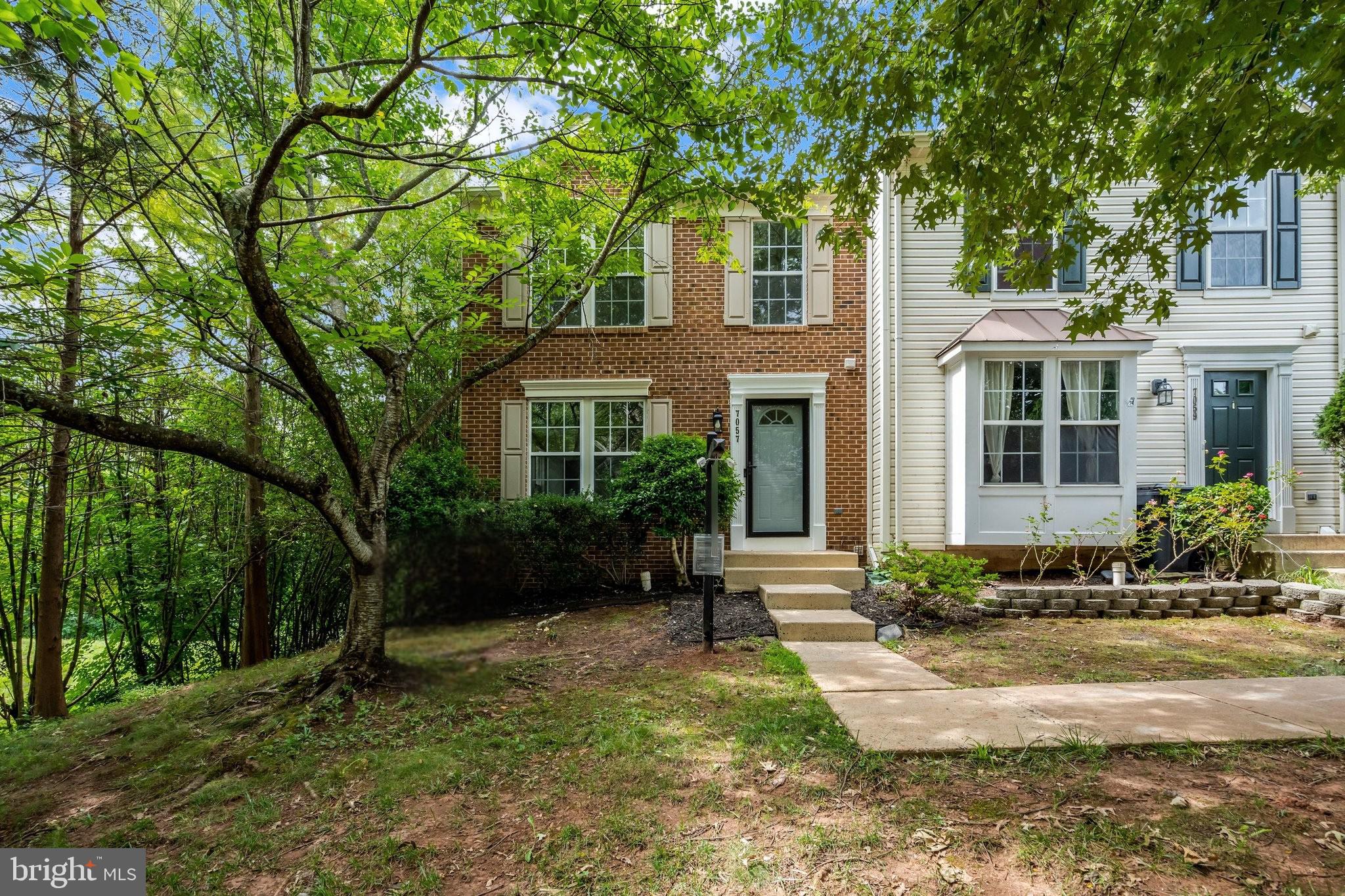 Welcome home to 7057 Sauvage Lane, where modern updates, outdoor living, and community amenities come together in one exceptional property. Nestled within the sought-after Greenhill Crossing neighborhood and within walking distance of historic Haymarket, this beautifully maintained end-unit townhome offers the perfect blend of comfort and convenience.

Step inside to discover over 2,280 finished square feet thoughtfully enhanced with brand-new luxury vinyl plank flooring, fresh designer-inspired paint, and numerous recent upgrades. The heart of the home is the spacious kitchen featuring granite countertops, an upgraded center island, and ample space for entertaining.

Upstairs, the generous bedrooms provide comfortable retreats, while the finished lower level offers additional flexible living space ideal for a home office, recreation room, or guest area.

Outdoor living shines with a fully fenced backyard, elevated deck, brand-new deck stairs, and an impressive custom stone patio creating multiple spaces to relax, entertain, and enjoy the outdoors.

One of the most cherished features of the home is its connection to the community's peaceful pond, complete with a water feature and stocked for fishing. Combined with mature landscaping and open community space behind the property, the setting feels private and serene.

Residents enjoy access to exceptional amenities including a community pool, pickleball courts, tennis courts, basketball courts, tot lots, and miles of walking trails. Whether you're purchasing your first home, downsizing, investing, or simply seeking a vibrant community lifestyle, 7057 Sauvage Lane delivers.