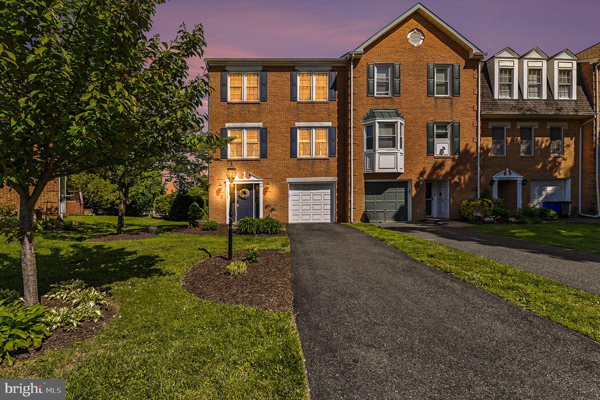 Beautifully updated and maintained brick, end-unit townhome in desired neighborhood of Amyclae Estates. This 3 bedroom, 2 full and 2 half bath, garage townhouse is a must see! It has a phenomenal layout for both everyday living and entertaining. As you walk into this 3 level townhome you will enter into a large foyer and immediately notice the abundance of natural light coming from the large sliders. Beyond the foyer is a rec room/additional family room or flex space. This level also has access to the one car garage, laundry and a half bath. The sliders open to a patio and beautiful backyard with lush landscape. On the 2nd level there is a spacious family room, a gorgeous kitchen and charming dining room. The kitchen has an elegant backsplash, sleek cabinetry and stainless steel appliances. The dining room is accented with custom picture frame molding. There is a large deck off the back of the house with access from both the dining room and kitchen. There is also a half bath on this level. On the upper level is the primary suite and 2 additional nice sized bedrooms and hall bath. The primary suite features a dual sided fireplace which it shares with the attached primary bath. The primary bath also has double vanities, separate shower and tub. This home is conveniently located to restaurants, shops and 95. There have been countless updates, don't miss this one!