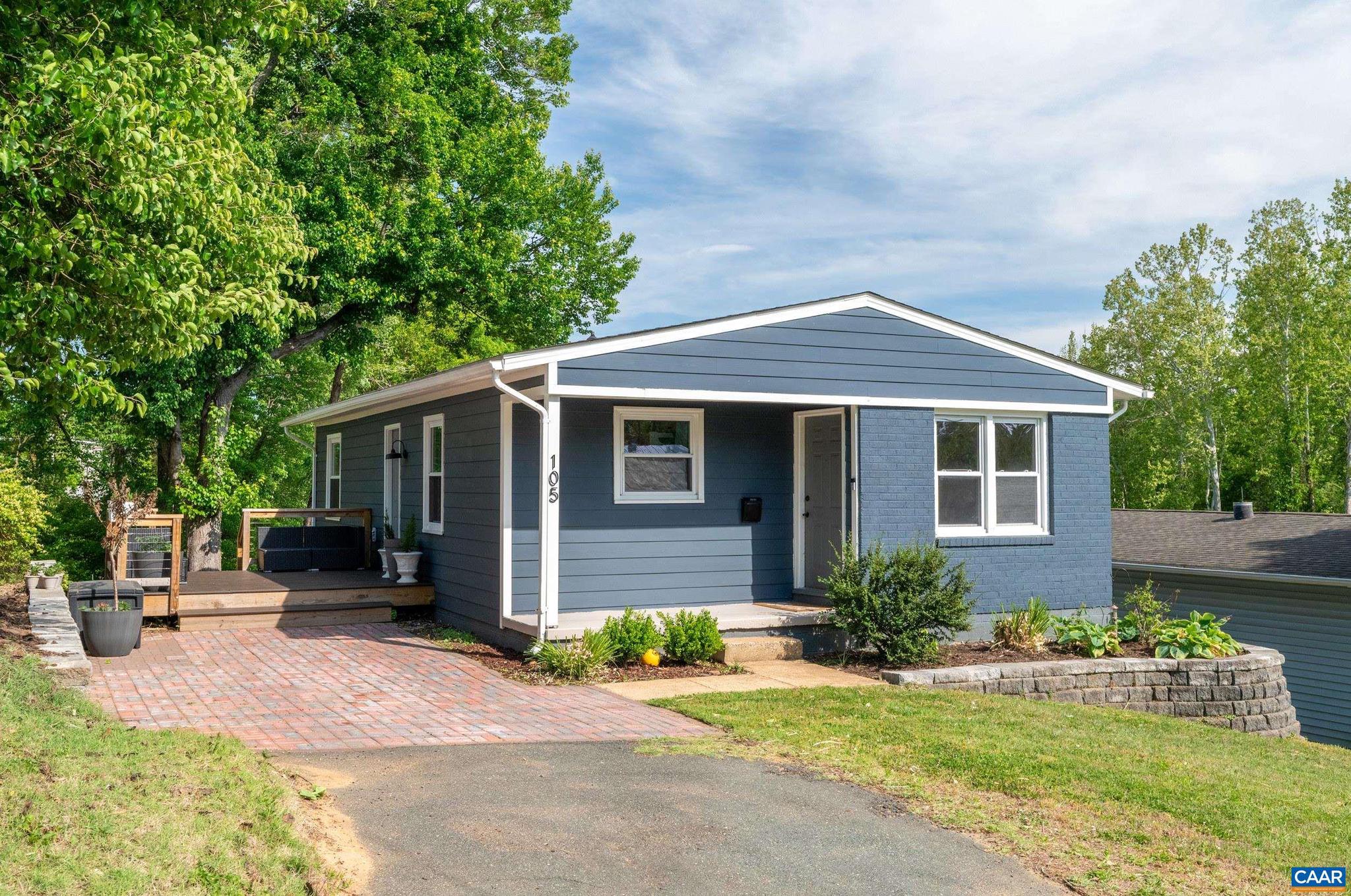 Fully renovated in 2023, this move-in-ready Charlottesville gem offers modern style, one-level living, and an unbeatable central location?under 7 minutes to UVA/hospital, 5th Street Station (Wegmans, Alamo, Starbucks), Rivanna Trail, Ix Park, and the Downtown Mall, with quick access to I-64 and Route 29. The home lives larger than its footprint, with bright, functional spaces that flow to a private outdoor retreat featuring a spacious deck and patio, perfect for relaxing or entertaining family & friends. A versatile, usable backyard, rare for the city, great for pets & kids. The updated kitchen (2023) features all-new cabinetry, butcher block countertops, stainless steel appliances, and luxury vinyl tile flooring, with ample space to cook and dine. Three bedrooms sit down the hall, along with a full bath accessible from both the primary bedroom (ensuite option) and hallway. A convenient half bath off the kitchen is ideal for guests. All major upgrades were completed in 2023, including a new roof, Hardie plank siding, HVAC, water heater, tiled shower, washer/dryer, and fresh paint. Walk-in crawl space with vapor barrier offers extra storage. Stylish, turnkey, and perfectly located, don?t miss it! Open this weekend 6/6 & 6/7 12-2!,White Cabinets,Wood Counter