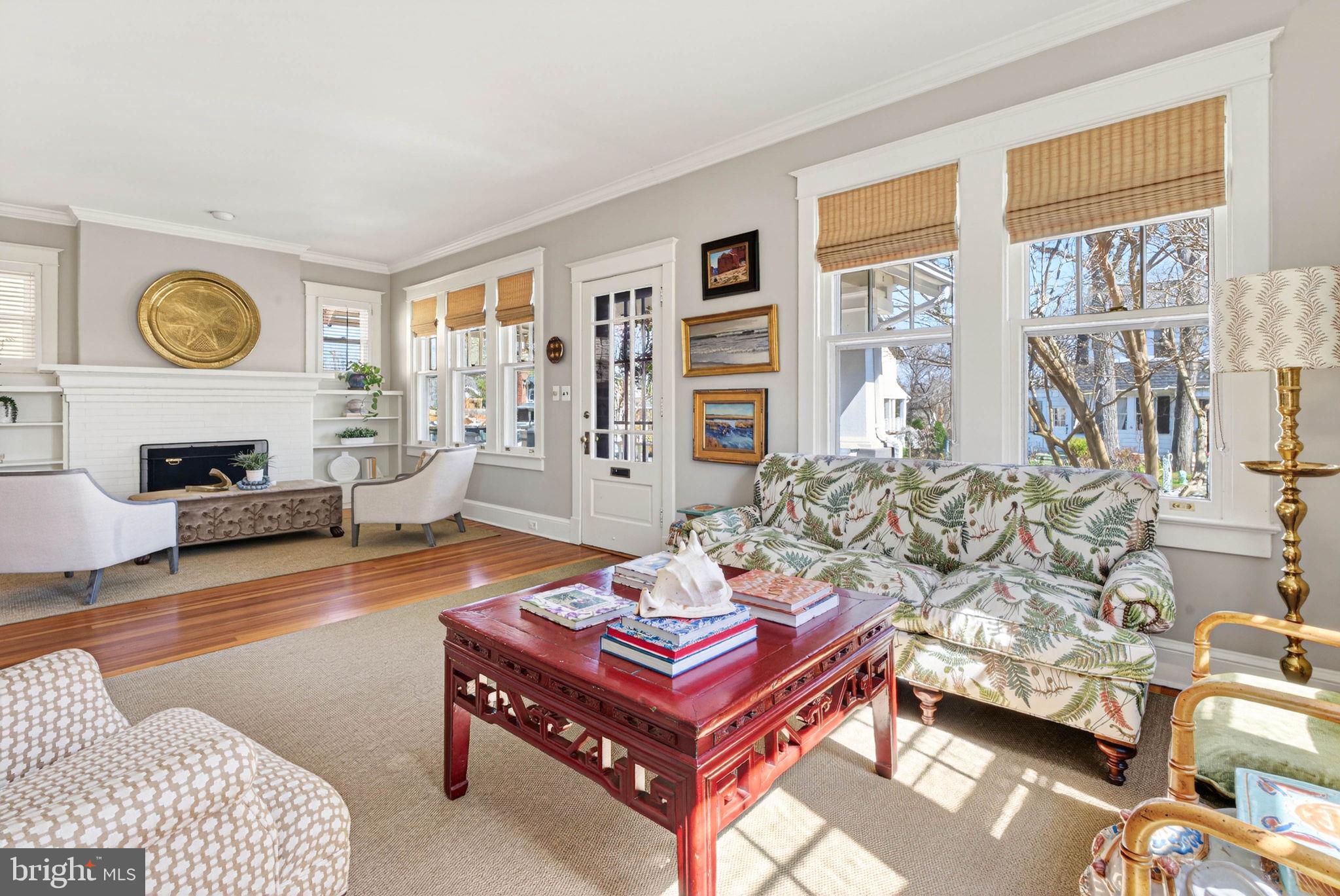 On offer deadline has been set. Please contact listing agent for more details or check private agent remarks. They truly don't build them like this anymore! Set in the heart of quiet yet convenient Cherrydale, 1816 N. Kenmore is an expanded and impeccably designed 1922 Craftsman bungalow with 2-story addition. This one-of-its-kind home stands out for its layout, and rarely available flat .23-acre lot walkable to so many Arlington conveniences. What might seem unassuming from the outside, welcomes you into an expansive, move-in ready home flooded with character, functionality, and room to grow! The home has been featured in both Washingtonian and Arlington Magazines and offers 4 bedrooms, 3 full baths, and over 3,000 square feet of thoughtful living space.

Step inside from your welcoming porch to Refinished oak hardwood floors running throughout, a wood-burning fireplace, and details that cannot be replicated today like crown molding, historic porticos, and functional built-ins. The gourmet kitchen hosts custom cherry cabinetry, updated stainless steel appliances, and Soapstone countertops. Schumacher fabric window treatments add warmth and personality and all convey, while other windows are enhanced with built-in plantation shutters. The great room is filled with natural light and creates an easy gathering space and flows seamlessly to the backyard to enjoy Spring and summer nights in your huge, private, and flat backyard. You'll find 9.5 and 10 ft. ceilings throughout the main level. Upstairs, you’ll find a primary suite with walk-in closet and its own private bath, and two more bedrooms with their own closets, a large hall cedar closet and charmingly painted bathroom. The main level full bath next to your 4th bedroom has been remodeled, and the lower level includes flexible spaces that could be used for a play room, office, guest room, or workout room, and includes a rough-in for a future full bath. There is plenty of storage in two separate storage and utility rooms.

Outside, the flat 0.23-acre lot is a rare find in Arlington. The fully fenced yard offers room to relax, entertain, and play with a patio, fire pit, hammock, mature trees for privacy, and a storage shed for extra space. It’s the kind of yard that’s hard to come by this close to everything.

This end of North Kenmore is a no-through street, which keeps traffic on an only-necessary basis, and it ends with a staircase connecting directly to the Custis Trail that leads to Orange line conveniences. From the home, you can also walk to Safeway, the Lyon Village Shopping Center, The Italian Store, Cherrydale Hardware and Burger Billy’s, along with other local neighborhood favorites in Cherrydale. This home is walking distance to numerous parks, including local favorites such as Oak Grove and Cherry Valley, with easy access to Science Focus Elementary school via a walking path.

The home has also been impeccably maintained with important updates, including roof replacement (2020), heat pump (2020), solar panels (2022--think being unaffected by rising electricity costs), washing machine (2021), dryer (2020), and sump pump replaced in 2018. Utility costs are much lower than average due to convenient and efficient solar power.  Ask listing agent for more information! Zoned for Science Focus Elementary, Hamm Middle, and Washington-Liberty High School, the location and lot size make this a standout opportunity in one of Arlington’s most loved neighborhoods. Own a piece of Arlington history, move-in, and design and do nothing but enjoy!