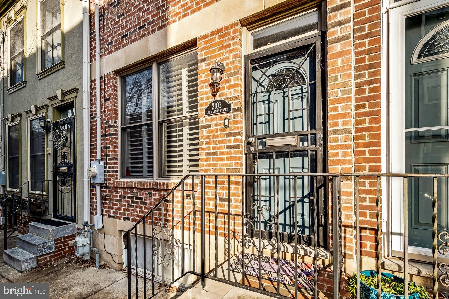 YES! You can have it all in Graduate Hospital with ONE CAR PARKING. Welcome home to 2103 Saint Albans Street. One of Philadelphia's most charming streets. This spectacular 3-story townhouse boasts 3 Bedroom/2.5 Bath and has approximately 2100 square feet of light filled living space, including a fully finished basement with a powder room that is fantastic FLEX space. Perfect for a family room/den/gym or office. The open concept first floor has gleaming, recently refinished hardwood floors, spacious dining area, and the kitchen that boasts granite countertops, all white maple cabinets and stainless steel appliances with a GAS range. A door off the Kitchen opens onto your very own large and secured carport (so you will never find yourself driving around in frustration again!) The second floor showcases two spacious bedrooms with customized Elfa closets from The Container Store that give the flexability to the owner that they can be reconfigured to suit anyone's needs and tastes, and a newly renovated, and tasteful, custom tiled hallway bathroom. Additionally, an open sitting area on this floor which is an additional excellent flex space for an office, homework station or a cozy reading nook. The principal suite occupies the entire third floor with high ceilings, large walk-in Elfa custom built closet and a beautifully renovated bathroom, outfitted with Carrera marble, classic white subway tile and a deep shower/tub combo. Glass sliding doors open onto a stunning and private deck that the owners have added a staircase up that leads you to the new TREX main roof deck, offering the owner, and your guests, breathtaking views of Center city and West Philadelphia skyline. PERFECT for entertaining.  With a walking score of 96, this home is in a prime location. Just a few steps away from public transportation, Fitler Square, and popular boutiques on South Street. You can start your weekdays with Fitzwater Street Philly Bagels and Ultimo Coffee, visit the Rittenhouse Square Farmers Market on Saturdays after a superb brunch at nearby Sabrina’s Cafe, and enjoy dinner and cocktails at the delicious Loco Pez. You'll find plenty of grocery stores, including Giant Heirloom Market and South Square market. The location is also a convenient walkable commute to UPenn, Drexel, CHOP, and Schuylkill Banks Park for recreational fun. Make 2103 Saint Albans Street your forever home today.