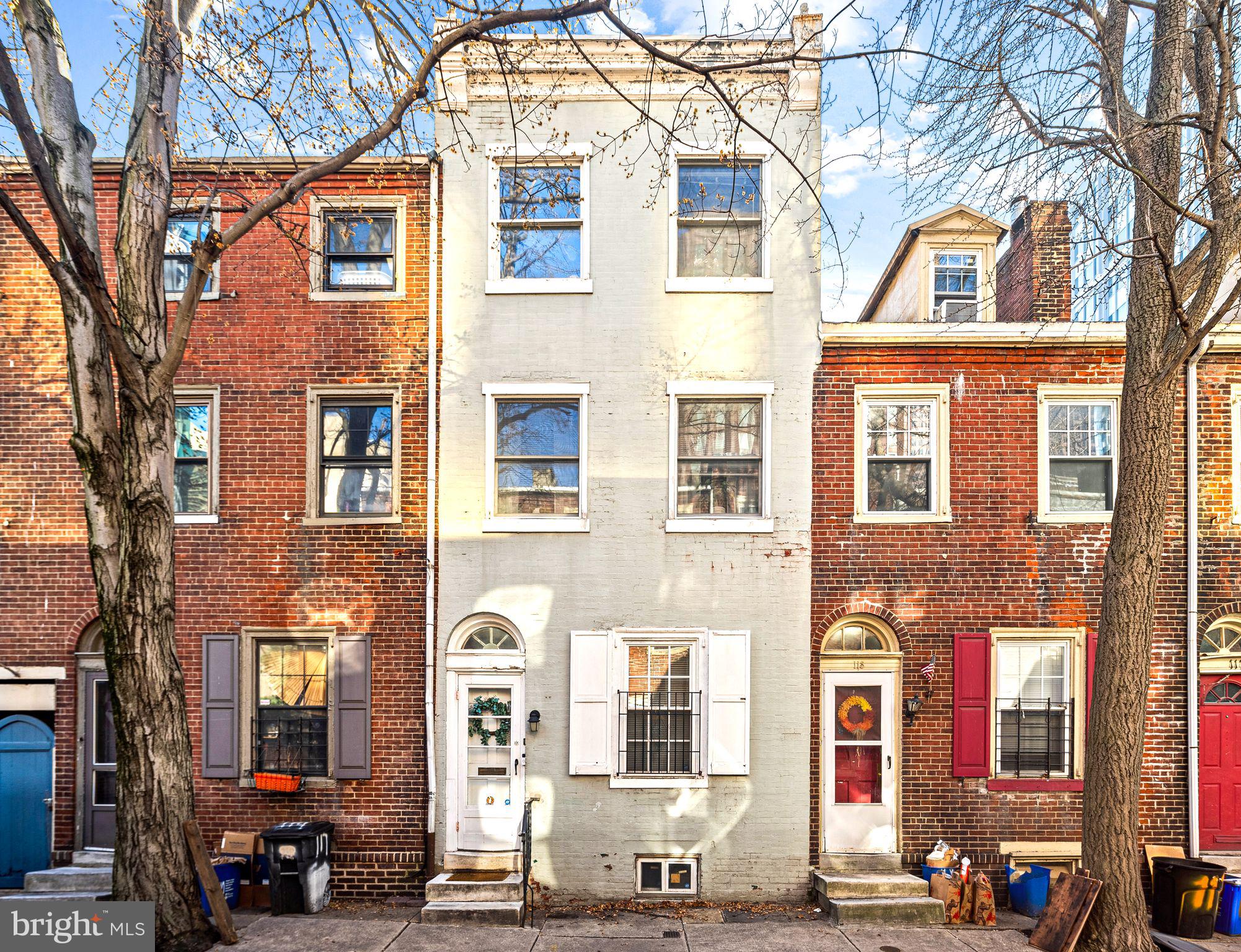 Don't miss this charming updated home in an unbeatable Center City location!
Absolutely adorable and move-in ready, this 3-bedroom, 1.5-bath home is perfectly situated on a quiet, tree-lined street in the heart of Center City—walk to everything! 

This bright and spacious three-story home blends classic charm with modern updates. Featuring hardwood floors, high ceilings, and abundant natural light throughout, the first floor welcomes you with a living room that flows into dining area. The recently renovated rear kitchen boasts stainless steel appliances, granite countertops, and stylish open shelving—plus a convenient half bath on this level. Step outside to your private red brick patio, perfect for BBQs or relaxing al fresco.

Upstairs, the second-floor primary suite offers a sunlit bedroom, a beautifully renovated bathroom with a tub, full-size laundry, and a generous linen closet. You'll love the huge walk-in closet, with plenty of hanging space plus a nook ideal for a vanity or desk.

The third floor offers two additional lovely bedrooms, perfect for family, guests, or a home office. Central air conditioning adds to your year-round comfort. The unfinished basement offers ample storage space. 

This Center City gem is a must-see—charming, updated, and in a prime walkable location that’s second to none.

Property is in Center City District which receives extra cleaning, trash pick ups, and security for additional tax of $241.07/ year.