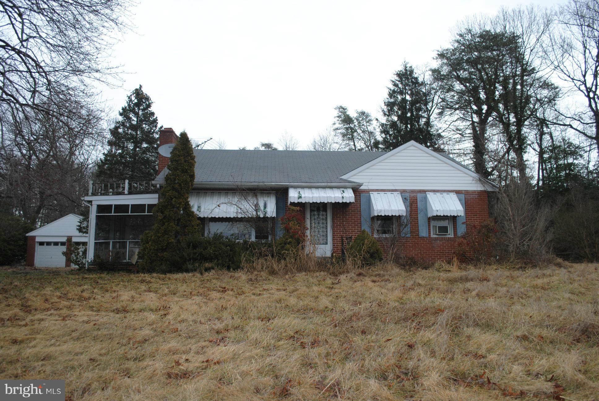 PROPERTY IS ACCROSS OUT BACK ON THREE NOTCH ROAD...The value is in the land -This property has a status of entering at your own risk please speak with listing agent before going in. RMX- ZONING
