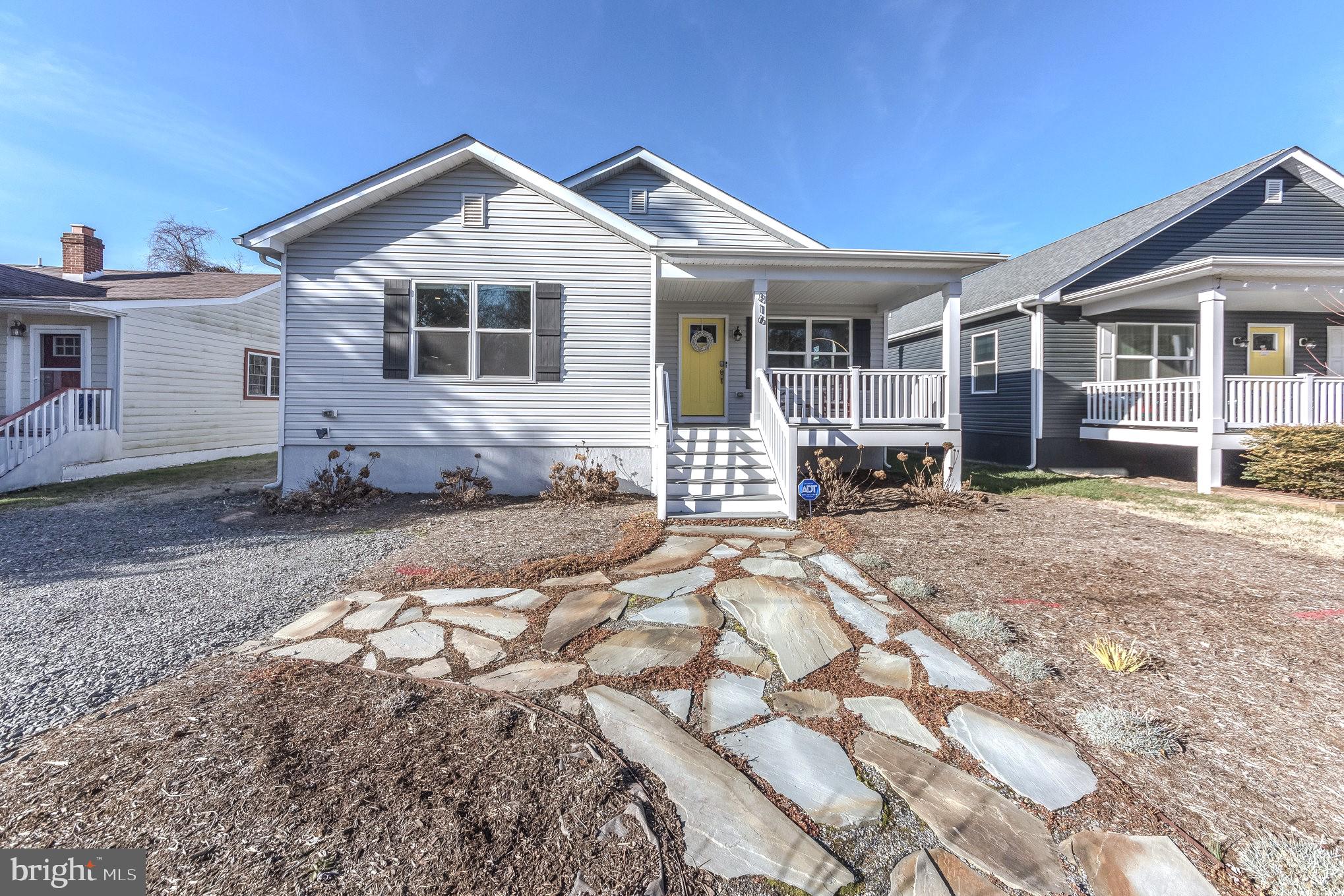 Just listed in the Town of Colonial Beach!  A 5 minute walk will take you to the waters edge where you can see beautiful sunrises -  and only a 10 minute walk to the sandy beach! Golf cart community! Built in 2021, this beautiful home has been meticulously maintained inside and out. You'll fall in love the instant you pull up in the driveway and see the welcoming front porch. The flagstone pathway has been planted with yellow Creeping Jenny for an amazing pop of color that looks incredible with the sunny yellow front door. Step inside and you'll find that the home has an open design which is both beautiful and spacious. Not only is the living room expansive, it is a great place to relax and unwind - and on cool winter evenings, enjoy the warm embrace of the woodstove. The kitchen will be your favorite part of the home with it's stunning granite countertops and sizeable island.  You'll love the stainless steel appliances, including the double oven where you can prepare delicious meals for family and friends. The under cabinet lighting highlights the gorgeous tile backsplash. The dining area is open to the kitchen as well, making it a great space for entertaining. Luxury Vinyl Plank flooring runs throughout the house giving it an updated, cohesive look. You'll find custom blinds throughout the house, as well. A convenient half bath  for your guests is just off of  the hallway, near the laundry room. There are two ample sized  guest rooms which each have access to a bright, clean Jack and Jill bathroom. The tranquil primary bedroom is spacious and has a well organized walk- in closet. Enter the private primary bath through the hidden pocket door and find a vanity with double sinks and a large shower stall. Access the backyard through a door at the end of the hallway. The rear deck is the perfect place for grilling or container gardening.  The barrels and crates around the deck contain blueberries and strawberries that will return each spring. Play yard games and host barbecues on the grassy lawn. The vinyl privacy fence will ensure that your little ones and/or fur-babies are safe at home.  Known for it's small town charm and sandy public beach, The Town of Colonial Beach also has  restaurants, antique/collectable shops, an arcade, ice cream vendors, venues that play live music, and more. Drive your golf cart all around town! The town hosts several parades, community events, and vendor shows each year. Westmoreland County is rich in history and has many historic sites to visit,  as well as wineries and breweries! This home is a great full time residence and would be a fantastic second home, as well. Schedule a showing today before it is too late.