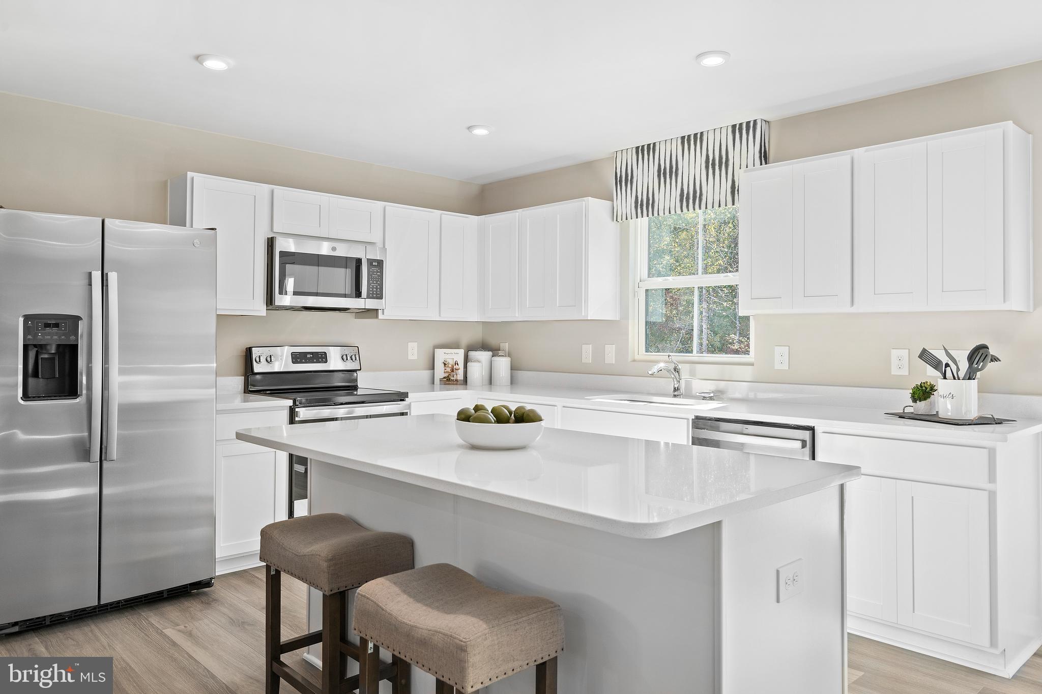 To‑be‑built Cedar plan at the Oak Leaf Meadows community!  This beautifully designed 4‑bedroom, 2.5‑bath home perfectly blends everyday functionality with modern features. Step into the welcoming foyer and continue into the spacious great room, which flows seamlessly into the gourmet kitchen featuring a large center island, brand‑new appliances, and an adjoining dining area—ideal for entertaining and daily living.
Just beyond the main living space, a hallway leads to a convenient powder room and a versatile flex space that can easily be used as a home office, hobby room, or play area. Upstairs, three of the four bedrooms feature walk‑in closets, along with a full hall bath and an upstairs laundry room for added convenience. The luxurious owner’s suite offers generous living space, a huge walk‑in closet, and a dual‑vanity bath. 
Oak Leaf Meadows offers an exceptional location in the Musselman School District—just 5 minutes to I‑81, 15 minutes to Martinsburg, and 20 minutes to Winchester. Closing assistance available with the use of the seller’s preferred lender. Lot premiums may apply. Other floorplans and homesites are available. Photos are representative.
Visit the model home at 186 Inola Court, Inwood, WV 25428, and learn why The Cedar is a must‑see!