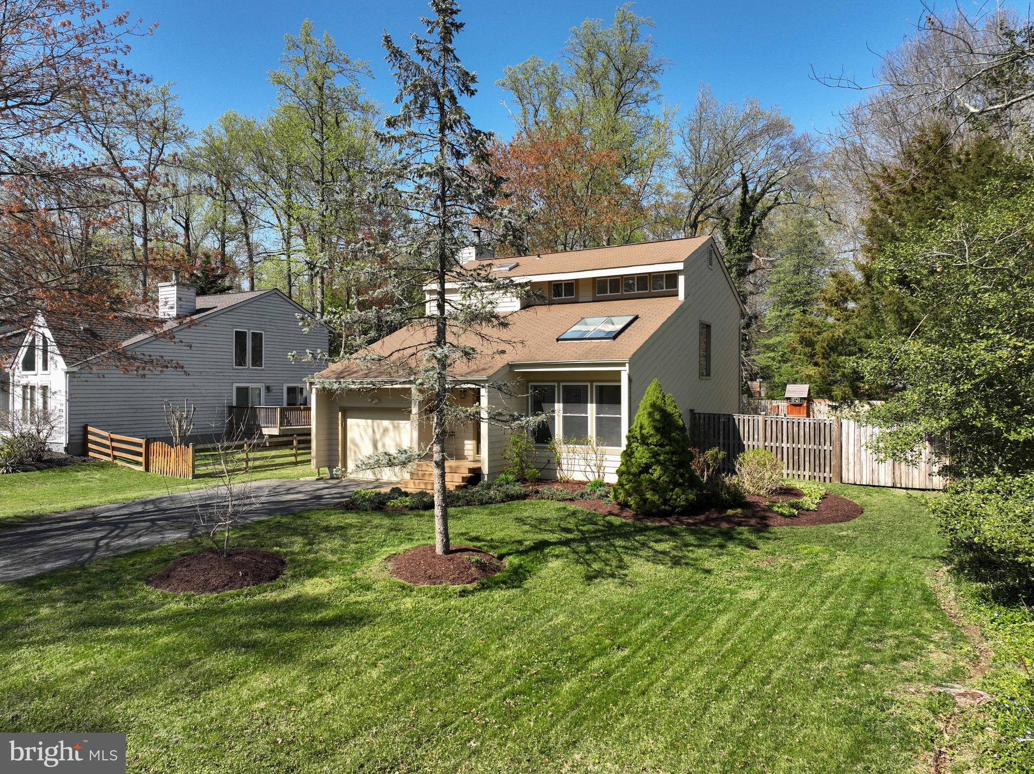 Turn-key home in water oriented community, where the South River meets the Chesapeake Bay!  Community Amenties include a sandy beach, marina, boat ramps, kayak/canoe storage racks & more!  Voluntary Civis Association $25/yr.    Inviting 2 story home with vaulted ceilings, skylights, hardwood floors on main level, kitchen is beautiful with granite counters, stainless appliances, pantry and breakfast bar.    Kitchen overlooks the family room, complete with fireplace and sliding glass doors to the deck.  Half bath on main level for guests, Laundry main level, garage, fully fenced back yard lg. double gate, shed (8'x8') & more!  The upper level features a large primary suite, complete with primary bath, and a walk-in closet.  There are 2 additional bedrooms on this level, and a full bath.  Located near Quiet Waters Park, Eastport, downtown Annapolis, shopping and dining.  Public library just up the street at the communty entrance.