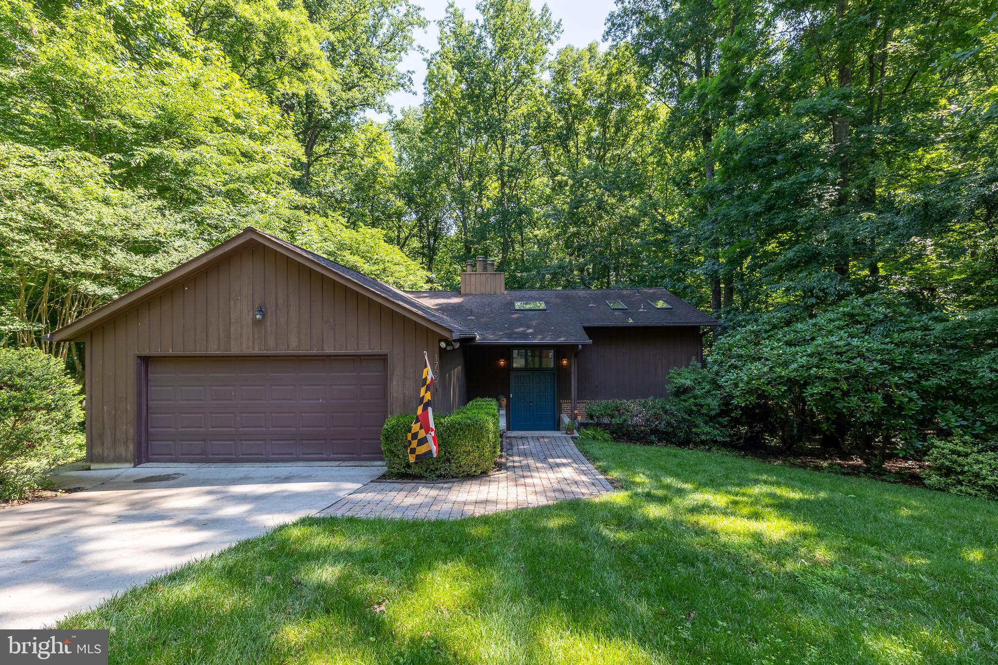 Private Contemporary Retreat in Annapolis! Tucked into one of the area’s most peaceful and private wooded settings, 1709 Point No Point Road offers a rare combination of total seclusion and unbeatable convenience. From the moment you arrive, the striking contemporary architecture, soaring skylights, and walls of windows connect you directly to nature, flooding the home with beautiful sunlight across all four seasons.

Inside, the flexible floor plan features 4 spacious bedrooms, 2.5 bathrooms, and multiple fireplaces designed for everyday comfort and effortless entertaining. The main living areas offer a natural flow with stunning wooded views, while the versatile lower level provides excellent additional space for a home office, recreation room, gym, or guest suite.

Outdoor living is a major highlight—maximize your indoor-outdoor lifestyle on the massive deck spanning the length of the home, surrounded by mature trees, serene landscaping, and a sense of calm that is hard to find. Complete with a 2-car garage and a premier location just minutes from Downtown Annapolis, the Naval Academy, shopping, dining, Route 50, and I-97. Schedule your tour today and step into your next chapter!