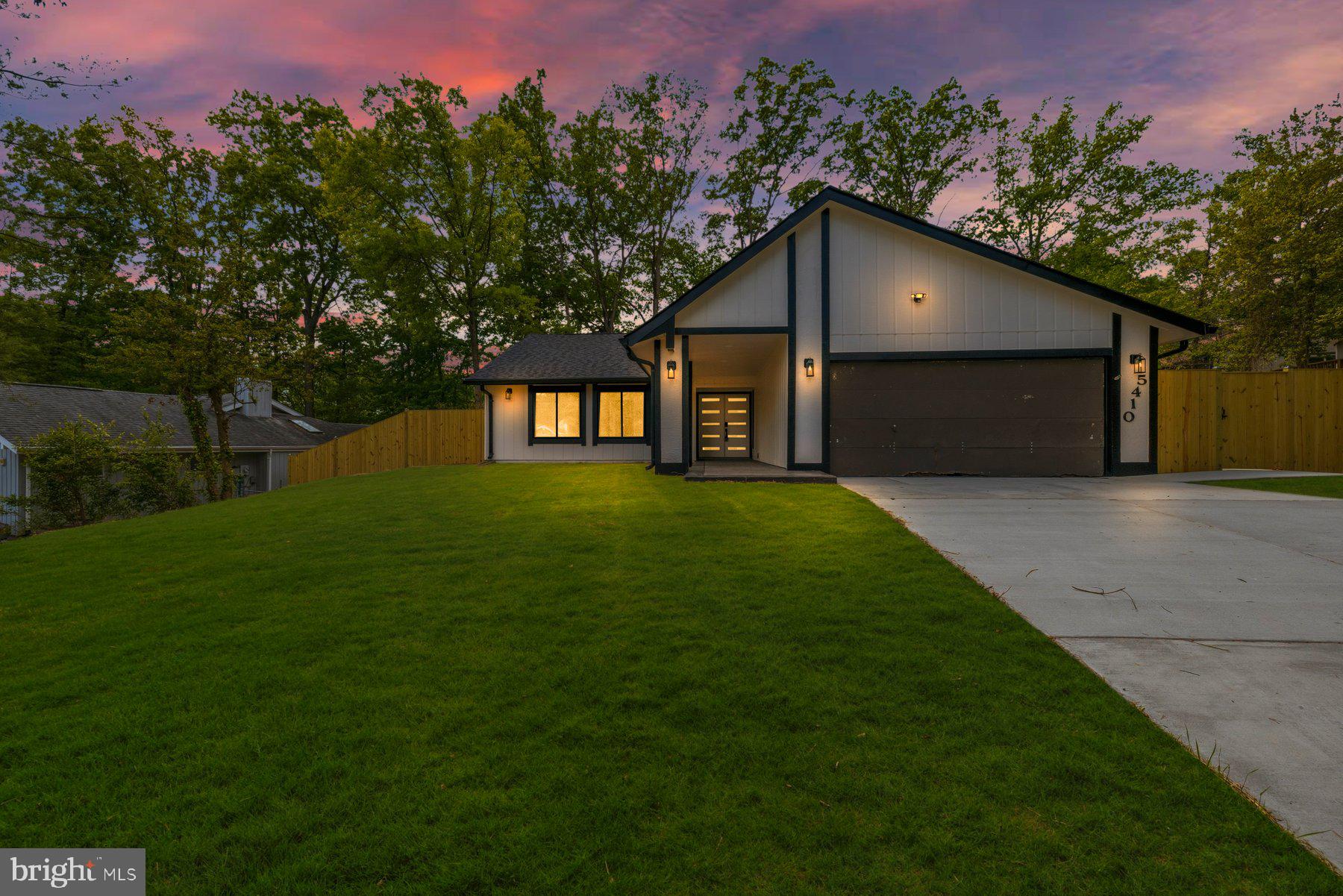 Welcome to this beautifully reimagined single-family home nestled in one of Fairfax’s most desirable neighborhoods, where modern design, thoughtful upgrades, and a clean, cohesive color palette come together seamlessly. From the moment you arrive, the attention to detail is evident with brand-new concrete work surrounding the home, including a new driveway, walkway, and stamped patio, complemented by a new roof, soffits, gutters, garage door, and a stylish front door. Inside, the home is transformed with fresh interior and exterior paint, elegant vinyl plank flooring throughout, and sleek new lighting that enhances the bright, contemporary feel. The open, modern layout showcases a stunning kitchen featuring custom cabinetry, quartz countertops, a designer backsplash, and high-end stainless steel appliances, creating a perfect blend of function and style. Offering three spacious bedrooms and two fully renovated bathrooms, each space is finished with high-end porcelain tile, custom vanities, and beautifully designed shower areas that elevate everyday living. Additional upgrades include a new HVAC system, newer water heater, and a completely updated laundry area, ensuring comfort and convenience for years to come. The sunroom provides a perfect transition between indoor and outdoor living, while the extensively landscaped backyard and newly finished concrete areas create a private setting ideal for relaxing or entertaining. With its move-in ready condition, modern finishes, and proximity to major highways, shopping, VRE, and more, this home delivers the feel of brand-new construction without the wait—an exceptional opportunity you don’t want to miss.