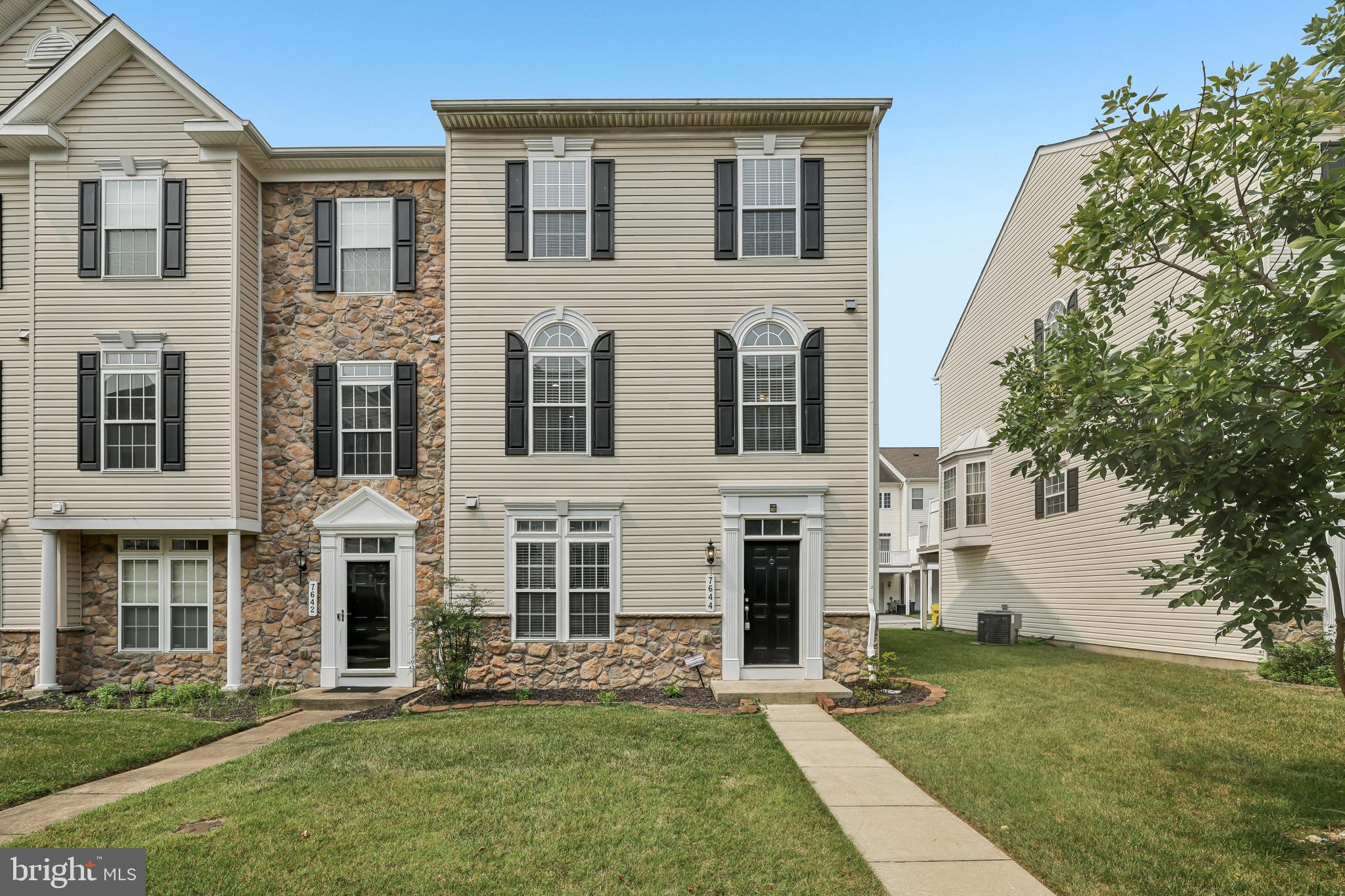 Welcome to 7644 Sandhurst Lane in Hanover! This end-unit townhouse offers 3 bedrooms, 2 full bathrooms, and 1 half bathroom with a well-designed three-level floor plan.

The entry level features a welcoming foyer, a private office that's ideal for working from home or flexible living space, a laundry room, and access to the attached garage.

The main living level includes a spacious living room and a generously sized kitchen featuring an island, ample cabinet space, and an adjacent dining area. Step outside to the deck, offering additional space for outdoor dining, relaxing, or entertaining.

The upper level features a primary suite with a walk-in closet and en-suite bathroom, along with two additional bedrooms and a full hallway bathroom.

Fresh paint throughout gives the home a clean, updated feel, and the end-unit location provides additional windows for abundant natural light.

Residents enjoy community amenities including a pool and clubhouse. Conveniently located near shopping, restaurants, and major commuter routes including I-295, MD-100, and I-95, this home offers easy access to Baltimore, Washington, D.C., Fort Meade, and BWI Airport.