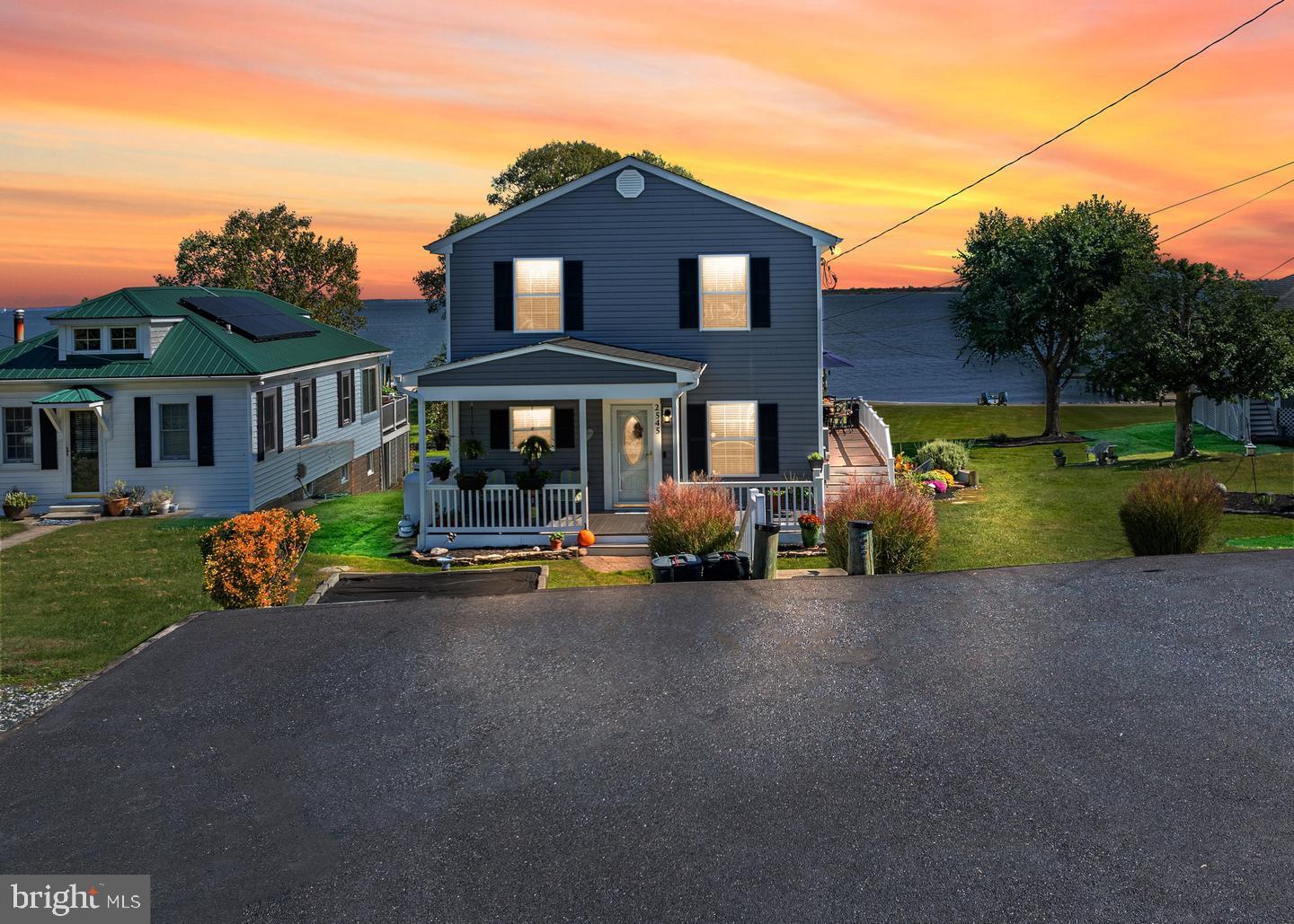 Live the waterfront lifestyle you’ve been dreaming of in this exceptional colonial perfectly positioned on a rare double lot totaling 0.46 acres with sweeping, unobstructed views of the Chesapeake Bay. Whether it’s sunrise coffee or sunset cocktails, every moment here feels like a getaway.
Boaters and water lovers will appreciate the impressive 6' x 72' private pier, fully equipped with jet ski lift just step outside and you’re on the water.
Inside this home blends classic elegance with thoughtful updates throughout. The eat-in kitchen features stainless steel appliances and opens into a bright, welcoming living space designed for both everyday comfort and entertaining. Walls of windows and direct access to the expansive two tier deck create seamless indoor/outdoor living making it easy to host or simply unwind while taking in the incredible views.
The upper level offers three spacious bedrooms, including a relaxing primary suite with an updated  private bath and soaking tub your own retreat at the end of the day.
The finished lower level provides additional versatile living space with a recreation room and convenient half bath, perfect for guests, game nights, or a home office.
Enjoy peace of mind with major recent updates, including a roof under 5 years old, newer siding (2–3 years), water heater under 3 years old, new HVAC, retaining wall and the added bonus of a whole house generator.
As an added opportunity the sale includes an additional .22 acre lot with potential for future use (buyer to verify with county).
This is more than a home it’s a lifestyle. Waterfront, privacy, flexibility, and unforgettable views all in one. Rarely does a property like this come along don’t miss your chance.
