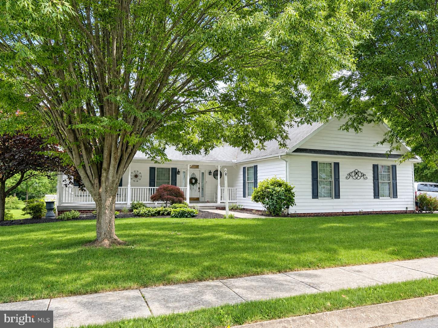 Welcome to 46 Clover Drive! This beautifully maintained, freshly painted one-level ranch offers the perfect blend of comfort, convenience, and community. Move-in ready, the home features a cozy gas fireplace, creating a warm and inviting living space, along with a spacious enclosed porch that's perfect for relaxing, entertaining, or enjoying peaceful views year-round.

For added peace of mind, the home is equipped with a large Generac generator, providing reliable backup power when you need it most.

Nestled on a quiet cul-de-sac with sidewalks throughout the neighborhood, you'll love the tranquil setting and welcoming atmosphere. The level backyard offers plenty of space for outdoor activities and is enhanced by a scenic stream along the rear of the property, creating a picturesque natural backdrop.

What truly sets this home apart is the sense of community, where neighbors feel more like family. Whether you're searching for your first home, looking to downsize, or simply want the ease of one-level living, 46 Clover Drive offers a lifestyle you'll be proud to call home.