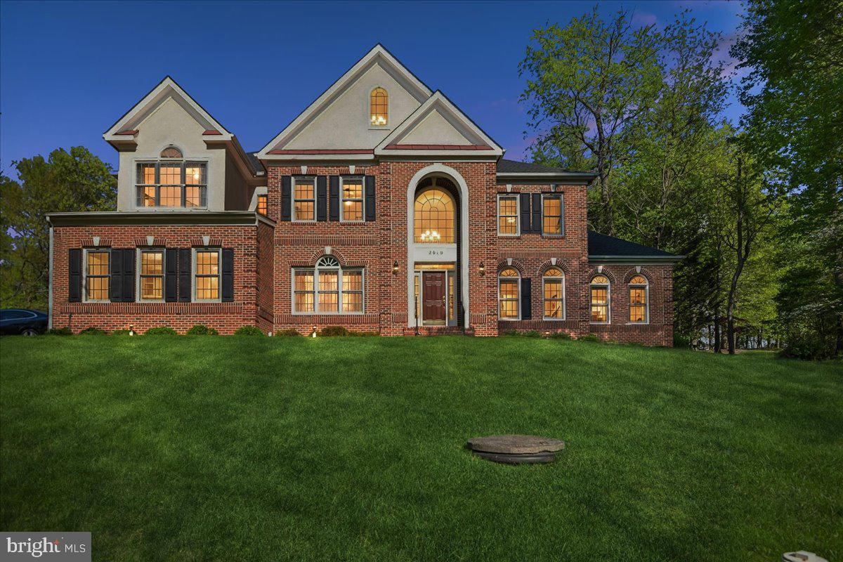 A masterpiece of custom design, this move‑in‑ready residence offers an exceptional blend of luxury, light, and livability. Sunlight pours through expansive windows, illuminating every corner and creating a warm, elegant ambiance throughout the home.

Thoughtfully curated updates elevate the property to a true luxury standard: a spa‑inspired primary bath retreat (2022), newly installed custom kitchen cabinetry with quartz countertops and backsplash (2023), a new roof (2022), hot water heater (2024), professionally refinished hardwood flooring and new bathroom flooring (2024), modern designer lighting (2022), and bespoke his‑and‑her walk‑in closets in the primary suite.

With 6 graciously sized bedrooms, 4.5 baths, and more than 7,000 square feet across three impeccably finished levels, the home offers both grand scale and intimate comfort. The dramatic two‑story family room serves as a breathtaking centerpiece, while the expansive main‑level mud/laundry room and 3‑car side‑entry garage—complete with Tesla wall charger—add everyday convenience.

The fully finished lower level provides exceptional versatility with a 6th bedroom, full bath, and abundant storage, making it ideal for guests, extended family, or private leisure spaces.
A rare offering that seamlessly blends luxury, privacy, and modern sophistication—this home is truly one to experience.
Seller prefers Mid Atlantic Settlement Services