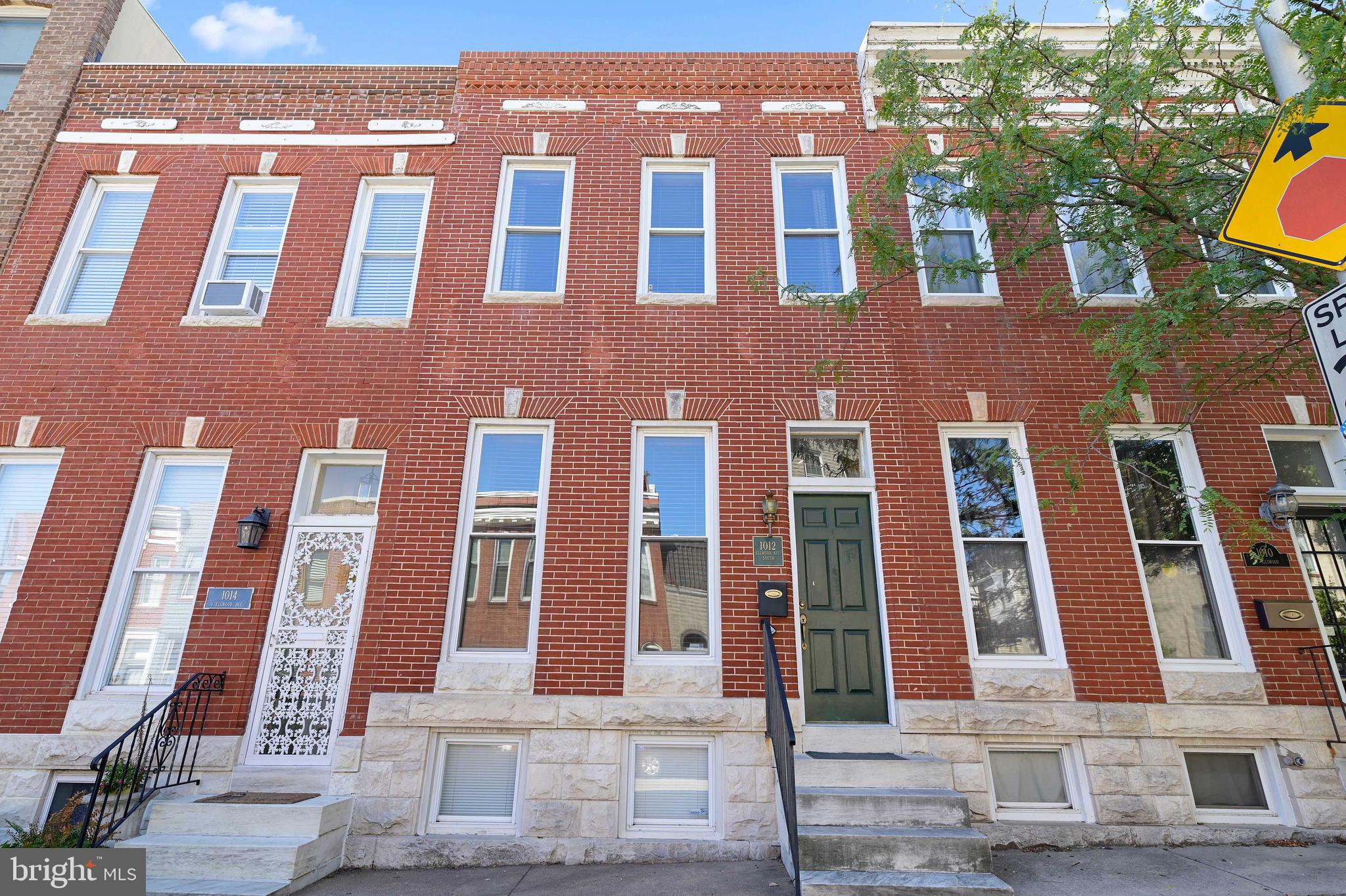 Welcome to 1012 S. Ellwood Ave. where old historic Baltimore charm meets new age design. This two bedroom townhome has 2 full bathrooms, a half bathroom on the main level, and a deck off of the back of each level. When you walk in the front door you are greeted by two beautiful natural wooden columns that are historic features from the early 1900s. The dining room to the left when you walk in has a fireplace with accent shelving. Towards the back of the home you will pass the stairs and enter into the living room where the open concept flows straight into the kitchen. There is a large deck off of the back of the kitchen and a nice sized fenced in patio area. There is a half bathroom off of the kitchen. The living room has a door that leads to a basement that runs the full length of the home which is perfect for storing a large quantity of items. Upstairs there is the owner suite to the right with an owners bathroom and an open interior window that lets natural light into the owners suite bathroom hall. The owners suite bathroom has a Jacuzzi tub and a separate shower. To the left of the stairs there is a full bathroom and another bedroom on the back of the home. The bedroom on the back of the home has its own private deck. This home is less than five minutes walking distance to ODonnell Square Odonnell Square’s restaurants and nightlife. This home is less than five minute drive to the target in Harris Teeter shopping center. The 95 exit is a seven minute drive from the home. This home was meticulously maintained by its owner and is ready for its new owner to indulge in fresh city living. Newly Sealed and Silver Coated Roof.