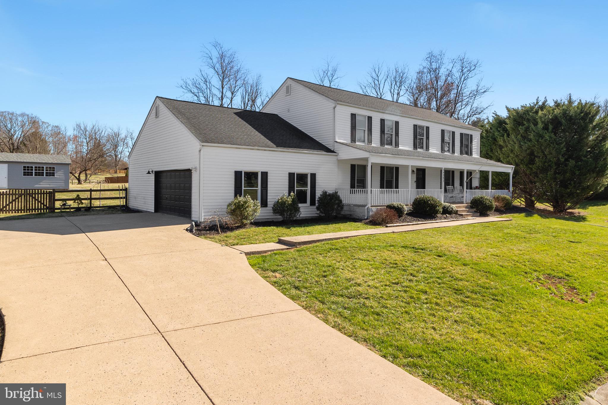 OPEN HOUSE SATURDAY CANCELLED> UNDER CONTRACT WITH MULTIPLE OFFERS. 

Discover this beautifully renovated colonial home, situated on over an acre within the historic STEPNEY PLANTATION ESTATES, established in 1908. Located on a corner lot, the property is fenced and enhanced with privacy trees, creating an exceptional backyard. The community is an unrestricted (no) HOA, carefully maintained with generously sized lots that ensure unparalleled privacy for each home.

Key features include:
* 3,000+ sq. ft. colonial home
* A 2-car garage with an electric car charger
* An extended driveway accommodating up to 6 additional cars
* A custom-built detached garage with electricity and a roll-up door

The elegant renovations, which began in 2019, have been masterfully executed, offering a sprawling first-floor design with a dramatic two-story entrance. The home includes a formal family room, a sun-filled office, and a chef's dream kitchen equipped with two-toned cabinets, a 12-foot island, state-of-the-art modern appliances, 42-inch cabinets, quartz countertops, and a marble backsplash, seamlessly connecting the breakfast area and formal dining area. The step-down gathering room with 10' ceilings, expanded by 4 feet and provides access to a 32' x 22' patio overlooking a private, meticulously manicured lawn.

Upstairs, the owner’s retreat features a separate lounging area, two walk-in closets, and a luxurious bathroom with a two-person shower, oversized soaking tub, and dual sinks. Three additional bedrooms offer ample closet space and natural light, complemented by a guest bathroom.

The expansive estate includes a 90% unfinished basement with preliminary rough-ins including framing, electrical, and plumbing. This space would finish a gathering room, bedroom with walk-in closet, full bathroom, flex room, and two utility rooms, awaiting your choice of drywall, paint, and flooring.

This low-maintenance home includes:
* Well & Septic system
* 3,024 sq. ft. of living space
* An additional 1,344 sq. ft. potential walk-out basement, totaling over 4,300+ sq. ft.
* Private trash service billed bi-monthly @ $75.00

Ask about the Assumable loan available!
