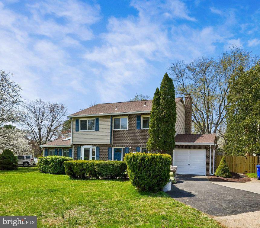 Welcome to 17720 Millcrest Drive, where timeless comfort meets everyday convenience in one of Derwood’s most established neighborhoods.
Set on a sunny corner lot framed by a brand‑new privacy fence, this thoughtfully updated home invites you in with stone accent wall,  warm hardwood floors and light‑filled living spaces with bay window designed for both relaxation and connection. The renovated eat‑in kitchen serves as the heart of the home, complete with granite countertops, glass tile backsplash, and an inviting breakfast area anchored by a charming fireplace—an ideal space for slow mornings or casual gatherings.
A rare main‑level bedroom with skylights offers flexible living options for guests, remote work, or multigenerational needs. Upstairs, four generously sized bedrooms each with a ceiling fan and large windows and walk‑in closets provide private retreats, while renovated baths and fresh finishes throughout create a true move‑in‑ready experience.
Outdoors, enjoy a level, fully fenced backyard with room to entertain, garden, or unwind—plus a newer storage shed and patio for seamless indoor‑outdoor living. With major systems already updated and no HOA restrictions, this home delivers peace of mind and lifestyle freedom.
Moments from scenic parks, recreation centers, Metro access, and Rockville Town Center, this is suburban living at its most convenient—and most comfortable.