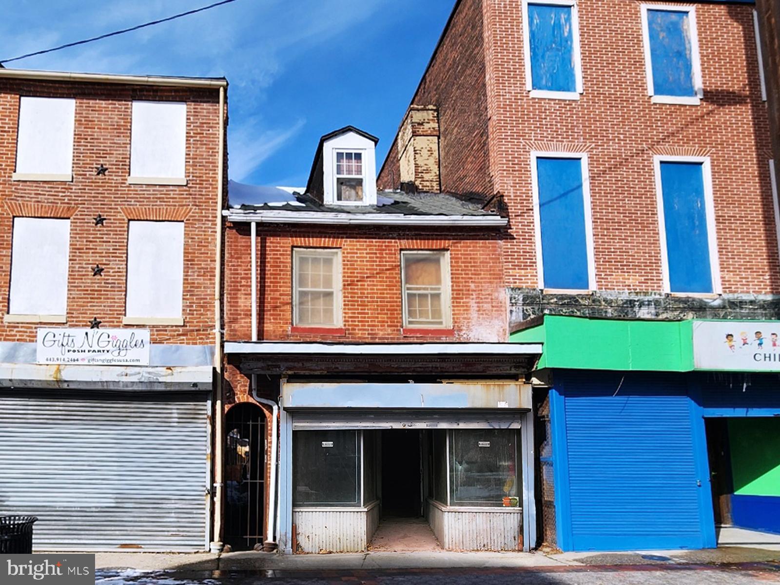 POST AUCTION! Make an offer, buy it now! Deposit: $5,000.
 
This two-story storefront townhouse is located in the Old Town Mall neighborhood of Baltimore City. Residents can enjoy the nearby attractions such as the John Hopkins Hospital, Northeast Market, Mercy Medical Center, Patterson Park, and the attractions in the Inner Harbor. The property is vacant. The area provides easy access to the major traffic arteries, I-83 & Orleans St, connecting to other parts of the city.