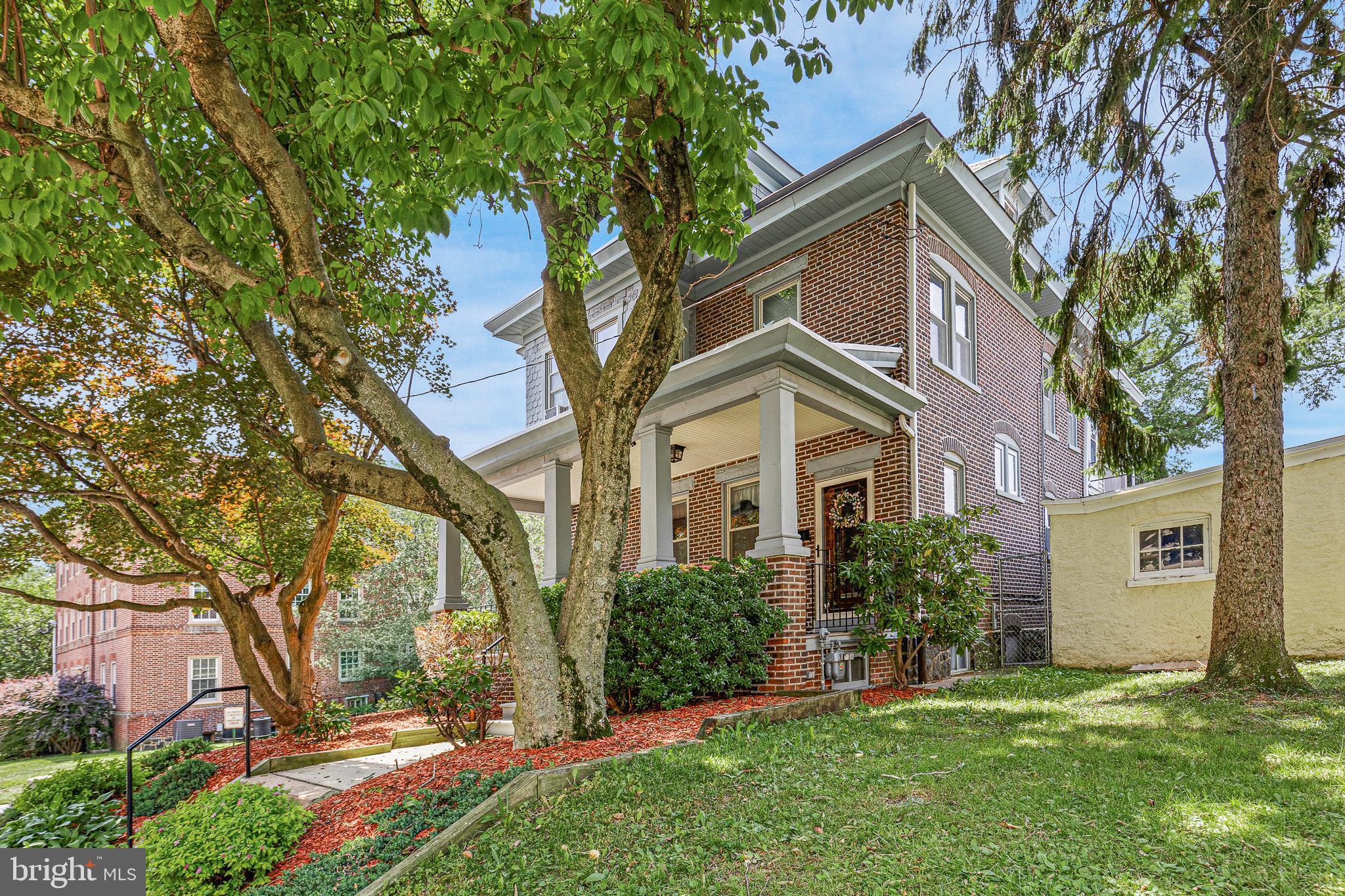 Executive duplex in a great Cool Spring location.   Upgrade your investment portfolio or live in one and rent the other. Great opportunity to own a beautifully maintained home in a prime city location.  Lovingly maintained by long-time owner-occupants, this well-cared-for duplex blends timeless character with thoughtful updates and exceptional pride of ownership throughout.

A welcoming covered front porch leads to a shared entrance. The first-floor residence opens into an inviting foyer, offering an immediate glimpse of the beautiful hardwood floors, custom millwork, and original architectural details that define the home. The spacious living room features a wood-burning fireplace, decorative wall sconces, and abundant natural light. Stunning original glass pocket doors with period hardware open to a formal dining room highlighted by an elegant coffered ceiling.

This level also includes a comfortable den with a convenient powder room, providing flexible living space for a home office, sitting room, or guest area. The primary bedroom suite features a tiled en-suite bath with a Jacuzzi tub, walk-in closet, and direct access to a bright and versatile sunroom that can be enjoyed year-round.

The updated galley kitchen offers granite countertops, stainless steel appliances, oak cabinetry, and a pantry with convenient slide-out shelving. Just outside, a spacious Trex deck overlooks the beautifully landscaped rear yard, creating an ideal setting for relaxing or entertaining.

The second-floor unit offers a flexible floor plan that can function as either a two- or three-bedroom residence. Features include a large eat-in kitchen with pantry, access to a charming balcony with views of the Wilmington skyline, and entry to a huge attic providing abundant storage space. Each room includes a ceiling fan, wall-to-wall carpeting, and solid wood doors.

Additional highlights include a low-maintenance brick and vinyl shake exterior, a detached two-car garage with electric service, 58 updated windows, custom radiator covers, built-in shelving, and a basement with excellent storage capacity.

This unique property presents a rare opportunity to own a beautifully maintained duplex filled with character, space, and versatility. Schedule your tour today before this exceptional home is gone.