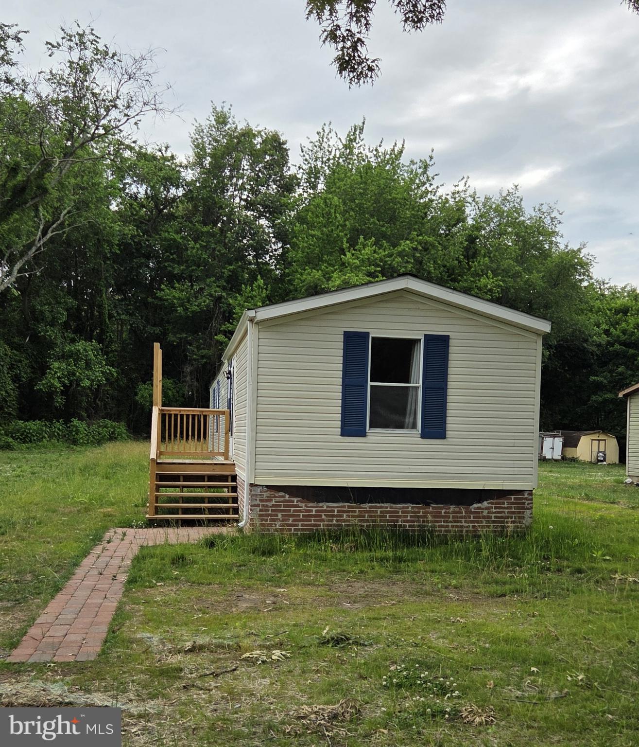 Great opportunity to own an updated mobile home on a brick foundation on over a quarter acre with NO LOT RENT!!! This is a rare opportunity to be very close to Dover in an affordable home. A must see. Cash Only Offers.