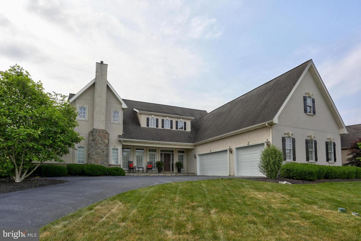 Bright and open floor plan spacious home in Manheim Township's Bent Creek community. Features hardwood flooring, trey ceilings, fireplaces, first floor laundry, office and ALL BEDROOMS WITH PRIVATE BATHS. UNIQUE FIRST FLOOR MASTER SUITE with trey ceiling, lighting, jetted corner tub and walk in closet. Large open kitchen with granite, island with breakfast bar, dual ovens and wine fridge. Unique  Full finished lower level great for entertaining with exercise room, possible 5th bedroom and private bath and media room. Spacious rear patio with stone fireplace leads to private backyard. Gated community with street lights and convenient location.
