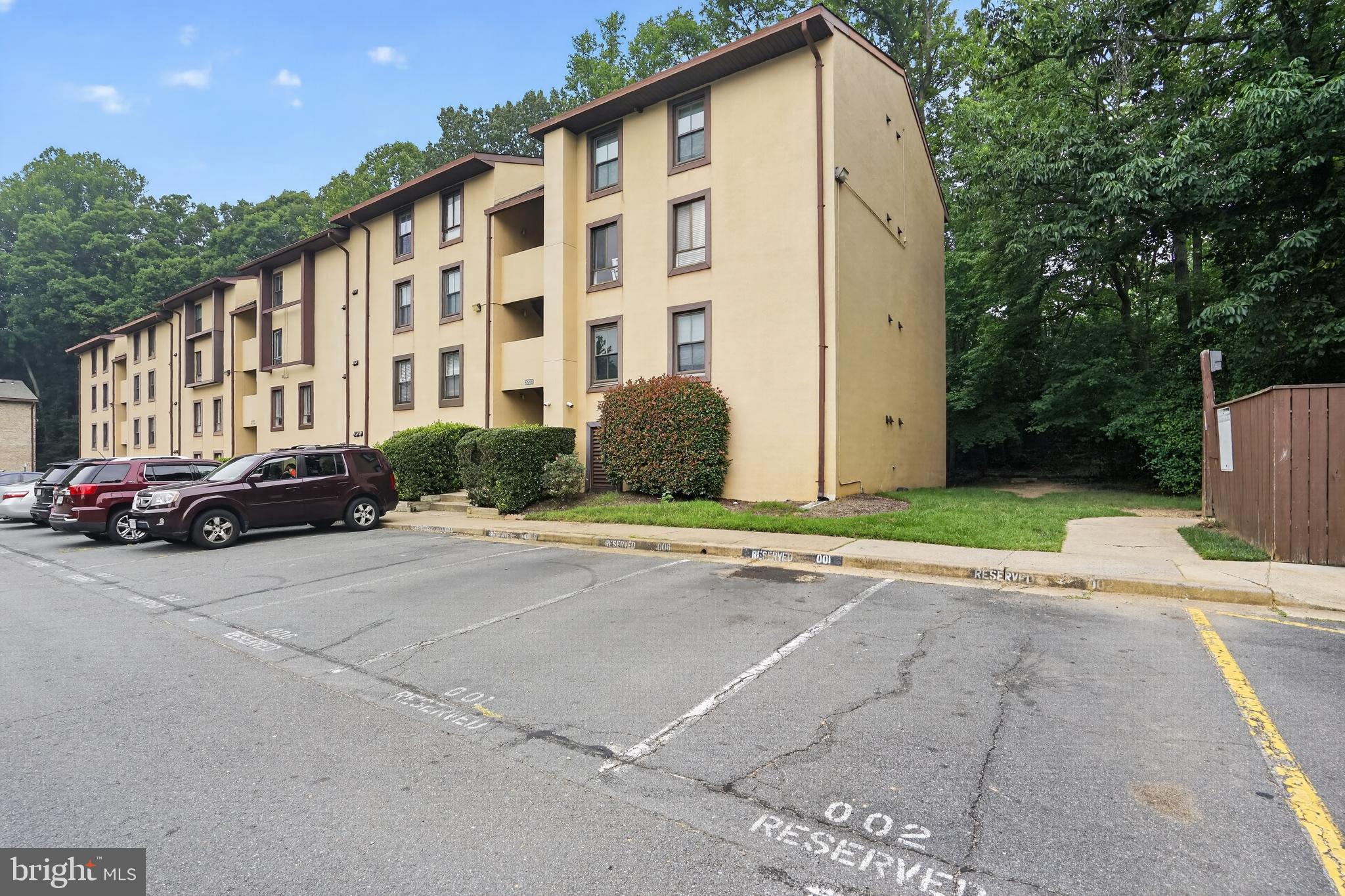 Fully renovated, turnkey 2BR/2BA first floor condo in Reston's popular Shadowood community! Freshly painted with brand-new flooring throughout, this inviting one-level flat features a recently remodeled galley kitchen with granite countertops, stainless steel appliances, and abundant cabinet storage. Both bathrooms feature modern upgrades, and a brand-new stacked washer/dryer is located right in the unit. An inviting dining space perfectly connects the kitchen and living areas, offering a cohesive layout designed for comfortable daily living. Decent size bedrooms with great closet space. Relax on your private patio with peaceful tree views! 2 assigned parking spaces plus ample visitor parking. HOA covers ALL utilities (electricity, gas, water, sewer, trash, snow removal) along with full building maintenance—including the HVAC and water heater system! Owners also enjoy full access to famed Reston Association amenities like pools, tennis courts, and miles of trails. Assigned additional storage space provided by community. Unbeatable commuter location: under a mile to the Metro, moments to Reston Town Center, major routes, and Dulles Airport. Welcome home!