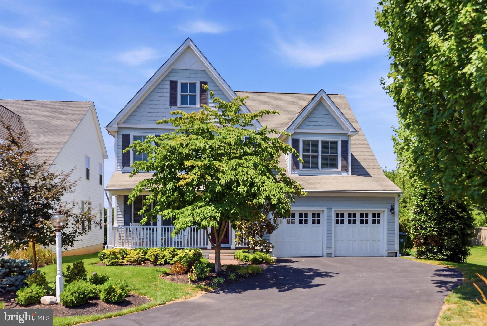 Step into a world where sophisticated design meets a tranquil, private escape. From the moment you arrive at the charming covered front porch, it’s evident that this meticulously maintained retreat is in a class of its own. The journey begins in a grand two-story foyer, where sunlight dances across gleaming hardwood floors, setting the stage for a home that feels both expansive and intimately inviting.

The main level is a masterclass in functional elegance. Behind stately French doors, a private office complete with custom built-ins offers a refined space for focus. For those who love to host, the formal dining room serves as a stunning backdrop, detailed with classic wainscoting and crisp crown molding. The heart of the home unfolds in the great room, where soaring coffered ceilings and a cozy gas fireplace create an atmosphere of understated luxury. Flowing seamlessly from here is the gourmet kitchen—a culinary enthusiast's dream featuring granite countertops, a sprawling center island, and premium stainless steel appliances. Whether you’re enjoying a casual bite in the breakfast area or relaxing in the three-seasons room with its charming beadboard ceiling, the connection to the lush outdoors is ever-present providing wonderful views of the 5th green at Bluestone Country Club.  

Practicality is woven into the design with a stylish mudroom featuring custom built in bench and easy access to the two-car garage. Upstairs, the primary suite is a true sanctuary of calm. Entered through double doors, this retreat boasts a dramatic tray ceiling, a dedicated dressing area, and a custom-fitted walk-in closet that would delight any fashion enthusiast. The ensuite bath feels like a private spa, equipped with a deep jetted tub, a large glass-enclosed tiled shower, and dual vanities. Two additional spacious bedrooms, a full guest bath, and a dedicated laundry room complete this level.

The lower level extends the living space even further with a beautifully finished basement, perfect for media nights or recreation. Every inch of this home has been curated for a refined lifestyle, offering a rare opportunity to own a piece of paradise in a truly picturesque setting.  Walking distance to the Blue Bell Inn and Panache as well as close promximity to downtown Ambler with plenty of shopping and dining options. Super close to major highways and public transportation and situated with in the Wissahickon School district.