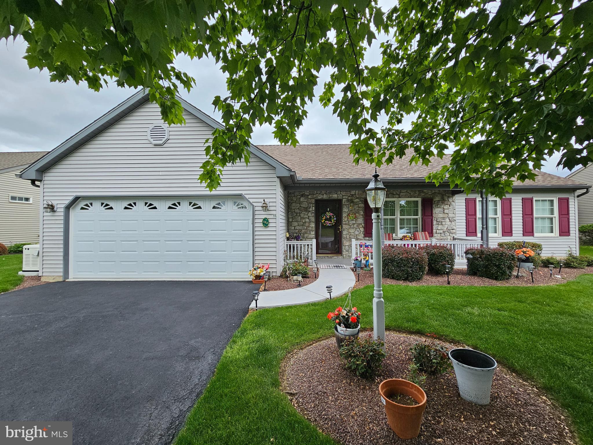 You will feel right at home when you step into this property located in the peaceful community of Arbor Gate in Myerstown.  This home has been exceptionally taken care of and pride of ownership shows throughout.  You will have peace of mind with the numerous updates made including a new full house Generac generator, new gas furnace, gas water heater, new window treatments, energy efficient insulation and a new garage door with keypad and security camera to name a few.  Please refer to the Sellers Property Disclosure for a list of improvements.  This home features 3 bedrooms and 2 full bathrooms with an open floor plan for the living room, kitchen and dining area.  Enjoy your days and evening in the cozy sunroom year round and the nice sized patio in the back with an automatic awning.  This is a unique home in Arbor Gate as there are no houses across the street!  Monthly Land Lease fee is $568.56 and includes your sewer and trash, Land tax, common grounds maintenance, access to the community lake, club house, fitness center and salon.  Carpets have been professionally cleaned and home is move-in ready!  ABOUT THE COMMUNITY:  Arbor Gate boasts excellent neighborhood features such as lovely, picturesque tree-lined streets, sidewalks, attractive front porches and street lights ensuring a safe tranquil environment.  There are many planned activities and amenities so there is always something to do.  Enjoy the calm surroundings on the 3-acre lake and there is also hiking and biking trails available.  Schedule your showing today and make this your home yours!  --OPEN HOUSE--  Open House will be held during Community yard sale on June 6th from 7 am to 10 am!