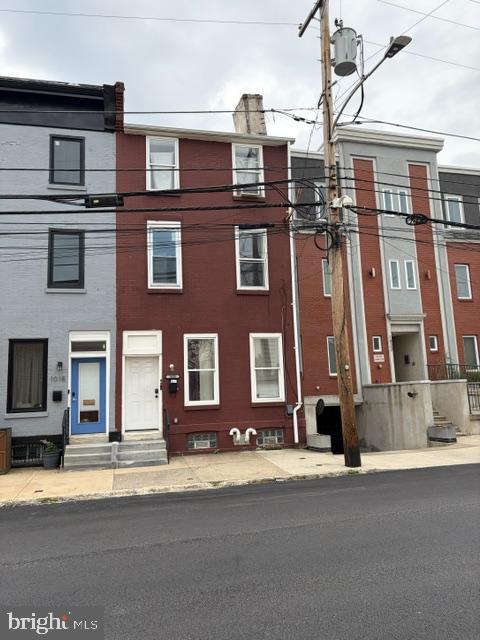 A beautiful house near the campus of Temple University and also very close to Chinatown district. It is a single family dwelling but the current owners  renovated it into 3 story 3 separate living quarters.  The 1st floor is still not done and the sellers will not complete it before delivery.    It is very good for a  buyer  to live in one part of the house and making some money.  Handyman will be at advantageous.