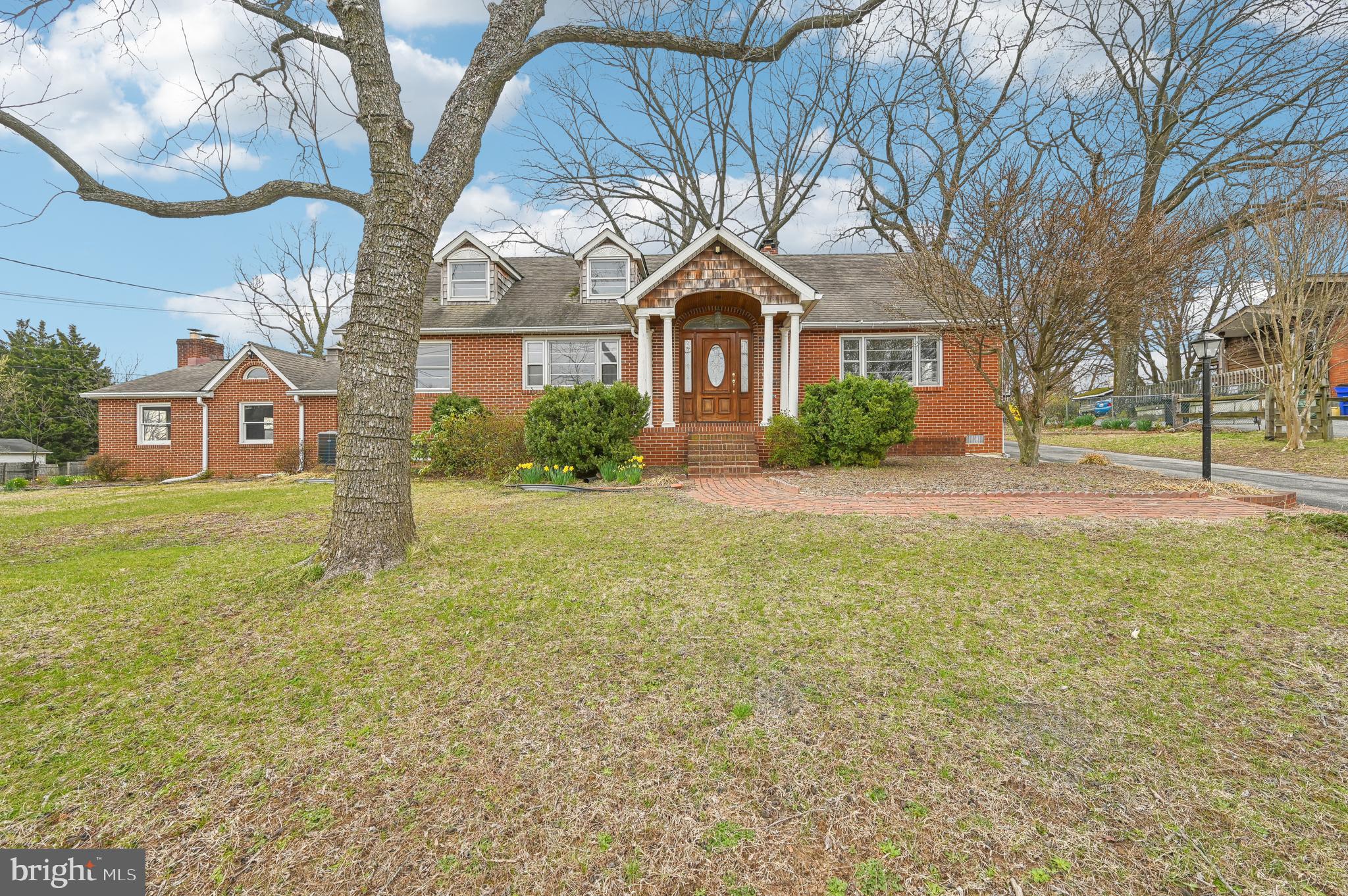 Final, best and no escalation clause due by 10:00am on 8 Apr.   Seller does have the right to select an offer prior to that time. -- This expansive home, situated on over 1 acre with two combined lots, is perfect for those who love space and versatility! Featuring 3 bedrooms, 2 full baths, and 3 half baths, it offers ample room for comfortable living. The fully finished basement includes a second kitchen, ideal for entertaining or creating a separate living area. With 4 fireplaces throughout the home, you can enjoy cozy ambiance in every season. The large garage offers extra storage space and includes a convenient half bath. A detached garage with a wood stove, electrical, and water provides even more potential for hobbies, workshops, or storage. Recent updates include a 2022 gas hot water heater and new HVAC systems installed on both the main and bottom levels in 2024, ensuring year-round comfort. Additionally, you'll find hardwood floors under all the carpet, ready to be revealed. This property truly has it all—comfort, convenience, and plenty of room to grow!