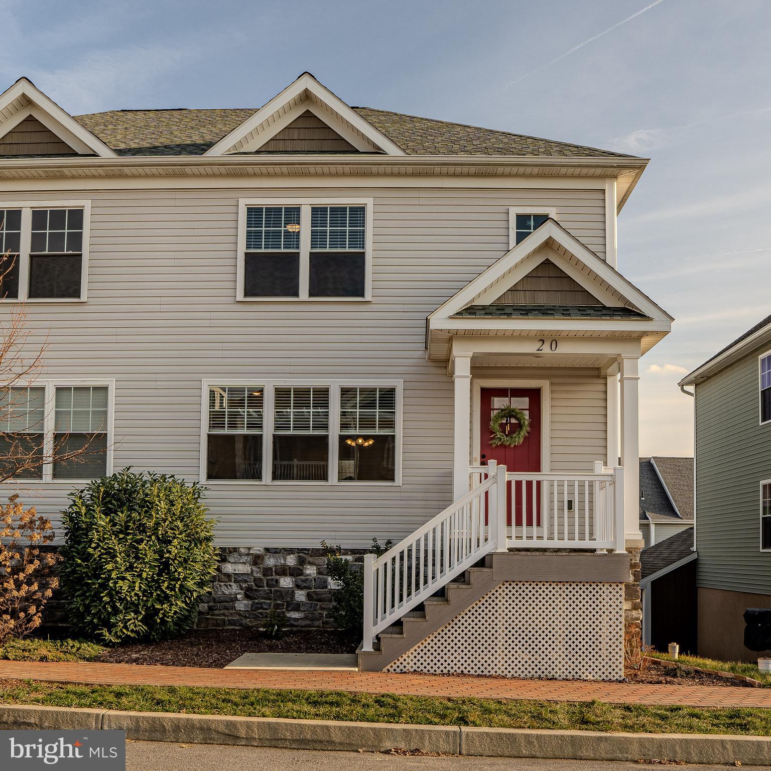 Welcome to this charming home in the desirable Wabash Landing community! As you step through the front door, you'll be greeted by an abundance of natural light streaming in through the numerous windows, creating a warm and inviting atmosphere.

The main floor boasts an open floor plan, ideal for entertaining family and friends. The spacious living area seamlessly flows into the kitchen and dining space, creating a perfect setting for gatherings. The kitchen is well-appointed with modern appliances and ample counter space with island, making it a chef's delight.

One of the highlights of this home is the covered patio, providing a lovely space for outdoor relaxation and enjoyment. Additionally, a covered deck offers an ideal spot for al fresco dining.

Venture downstairs to the finished lower level, where you'll find a comfortable family room complete with built-in shelving, cabinetry for added convenience. This space is perfect for cozy movie nights or as a recreational area. The family room also features a convenient sink and mini refrigerator, adding a touch of luxury to your entertainment space. A half bath on this level ensures convenience for both residents and guests.

The lower level is a daylight basement with a walkout, providing easy access to the outdoor spaces. This feature enhances the overall functionality of the home, seamlessly connecting indoor and outdoor living spaces.

With its thoughtful design, modern amenities, and prime location in Wabash Landing, this home is a fantastic opportunity for those seeking comfort, style, and a welcoming community ambiance. Don't miss the chance to make this residence your own and enjoy the best of both indoor and outdoor living!