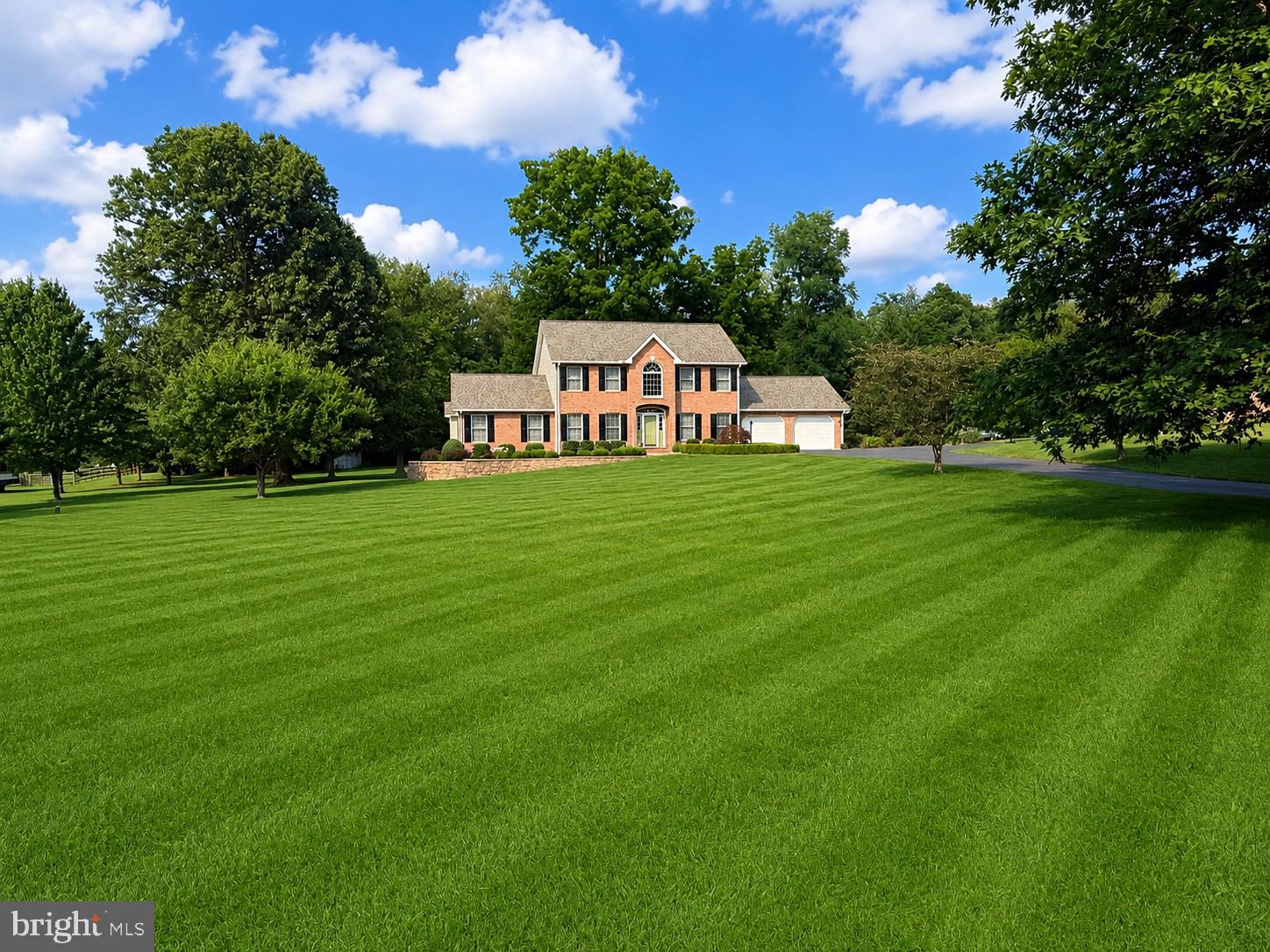 Welcome to 221 Hadley Drive, Falling Waters, WV—a stately 3-bedroom, 3.5-bath home situated on a private 2.32-acre lot, with a manicured level lawn, backing to mature trees. This custom built colonial was constructed by Gary Potts- the quality craftsmanship coupled with the homeowners meticulous maintenance makes this home a true gem! With 2,688 square feet of above-grade finished living space, this home is thoughtfully designed for both everyday living and entertaining.
Step inside to find custom red oak hardwood floors gracing the foyer, staircase, and upper landing, creating a warm and elegant first impression. The spacious family room features a soaring cathedral ceiling and a cozy gas fireplace, making it the perfect gathering space year-round. The kitchen is complete with a spacious island, granite countertops & stainless steel appliances. The kitchen and bathrooms are finished with durable ceramic tile flooring, combining style with easy maintenance. All upper bedrooms are spacious & master suite has an ensuite master bath with dual vanity sinks, separate shower & jetted soaking tub.
The walk out  lower level boosts  an additional 1000 sq ft of living space featuring a full  in-law suite- complete with large living/dining area, full kitchen, full bath & 2 spacious dens!
 For added value and peace of mind, the home features a roof that is only 2 years old. Step outside to enjoy the rear deck overlooking the expansive ,pristine 2.32-acre property,
Conveniently located just 5 minutes from the Maryland state line, this property offers an ideal commuter location while providing the privacy and tranquility of country living. Combining quality craftsmanship, thoughtful updates, generous acreage, and an exceptional location, this is a home you won't want to miss.
Located close to 81 & shopping/ Spring Mills School District!
Community HOA is not active nor enforced!