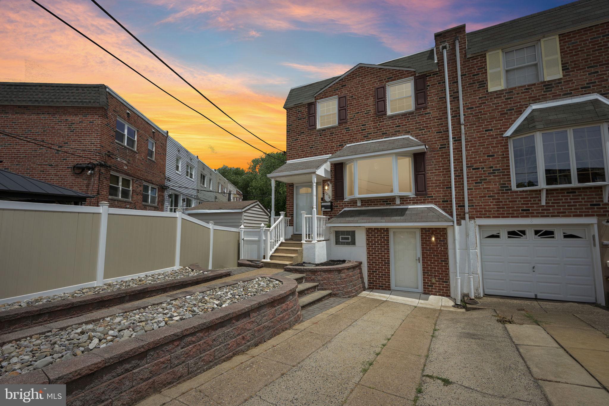 Nestled on a quiet block in Northeast Philadelphia, this beautifully maintained home offers the perfect combination of indoor comfort and outdoor living. From the moment you arrive, you'll appreciate the attractive brick exterior, private driveway, and inviting curb appeal.
Step inside to discover spacious living areas designed for both everyday living and entertaining. The finished basement provides valuable additional living space, ideal for a family room, media room, home office, gym, playroom, or guest retreat. Whether you're hosting friends or simply relaxing at home, this flexible space adapts to your lifestyle.
One of the standout features of this property is the exceptional outdoor setting. The upgraded deck extends seamlessly from the home and overlooks the backyard, creating the perfect space for morning coffee, summer barbecues, and outdoor gatherings. From the deck, step down into the expansive, professionally landscaped yard featuring attractive hardscaping, mature trees, and plenty of room for recreation.
Beyond the fenced yard, you'll enjoy the rare benefit of open space directly behind the property, providing added privacy, scenic views, and a peaceful natural backdrop that's difficult to find in the city. The combination of lawn space, garden areas, and open views creates a true backyard oasis.
Additional highlights include:
Finished basement with versatile living space
Upgraded deck with direct access to the backyard
Large, fenced yard with beautiful landscaping and hardscaping
Property backing to open space for added privacy and tranquility
Private driveway and garage was converted to storage room or work out room.  
Well-maintained brick exterior
Home is freshly painted
Hardwood floors recently refinished
Convenient Northeast Philadelphia location close to shopping, dining, parks, and major commuting routes
This is a rare opportunity to own a home that combines functional living space with exceptional outdoor amenities. Whether you're entertaining on the deck, enjoying the expansive backyard, or relaxing with the peaceful views of the open space beyond, 12534 Fedor Road offers a lifestyle you'll love coming home to.  

All VA Buyers Welcome!!