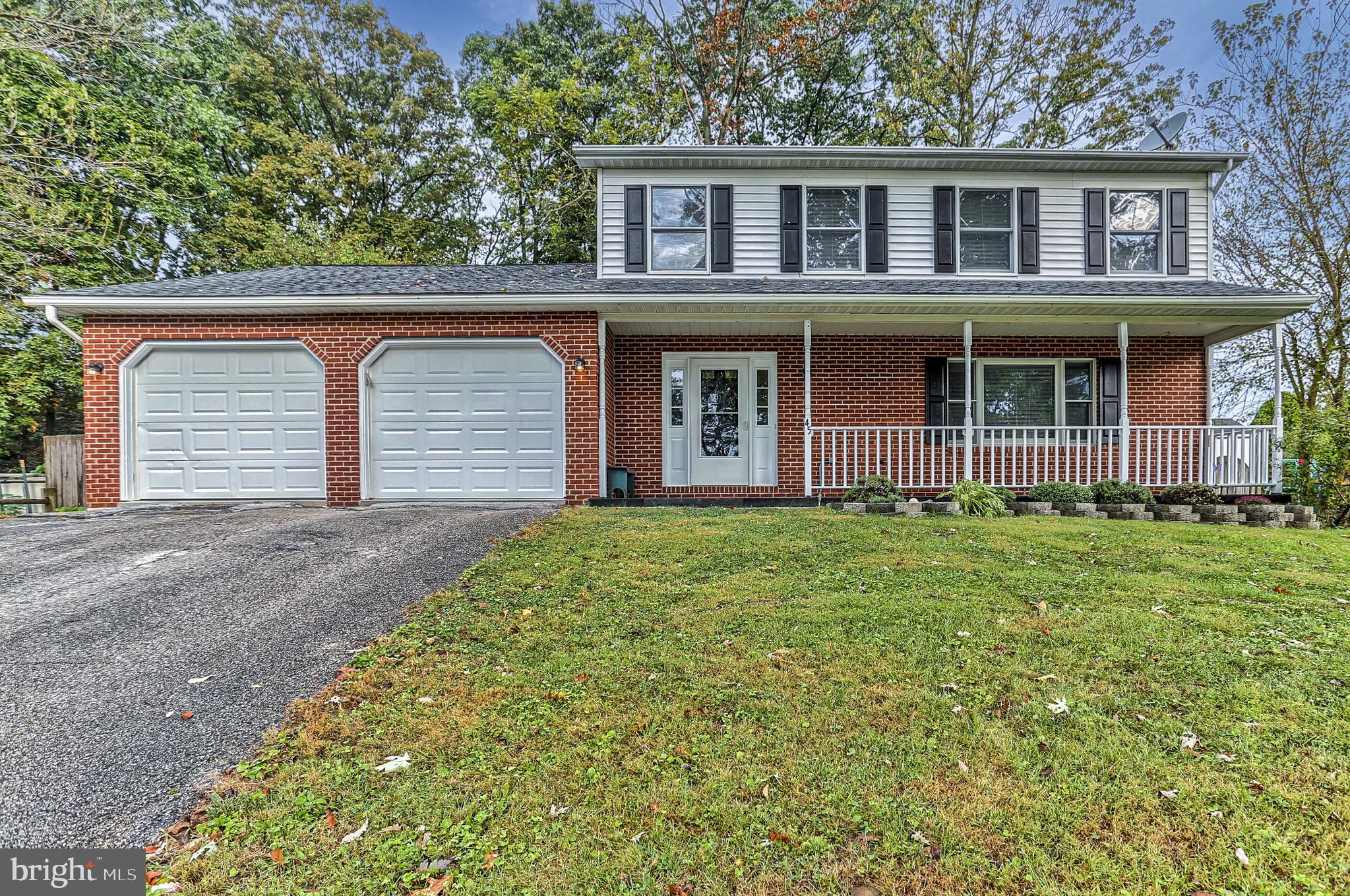 From the front porch to the rear deck in the fenced in backyard, this 4 bedroom, 2 1/2 bath home is the place for your new memory making! Spacious eat in kitchen with island opens to deck and adjoins family room with wood burning fireplace! Separate formal dining and living room! Lower level includes large finished family room and office or den! Minutes from Kids Kingdom Community Park, outdoor adventures at nearby Codorus Lake and yet just as close to shopping and restaurant amenities! One year HMS Home Warranty included! Call for your showing today!