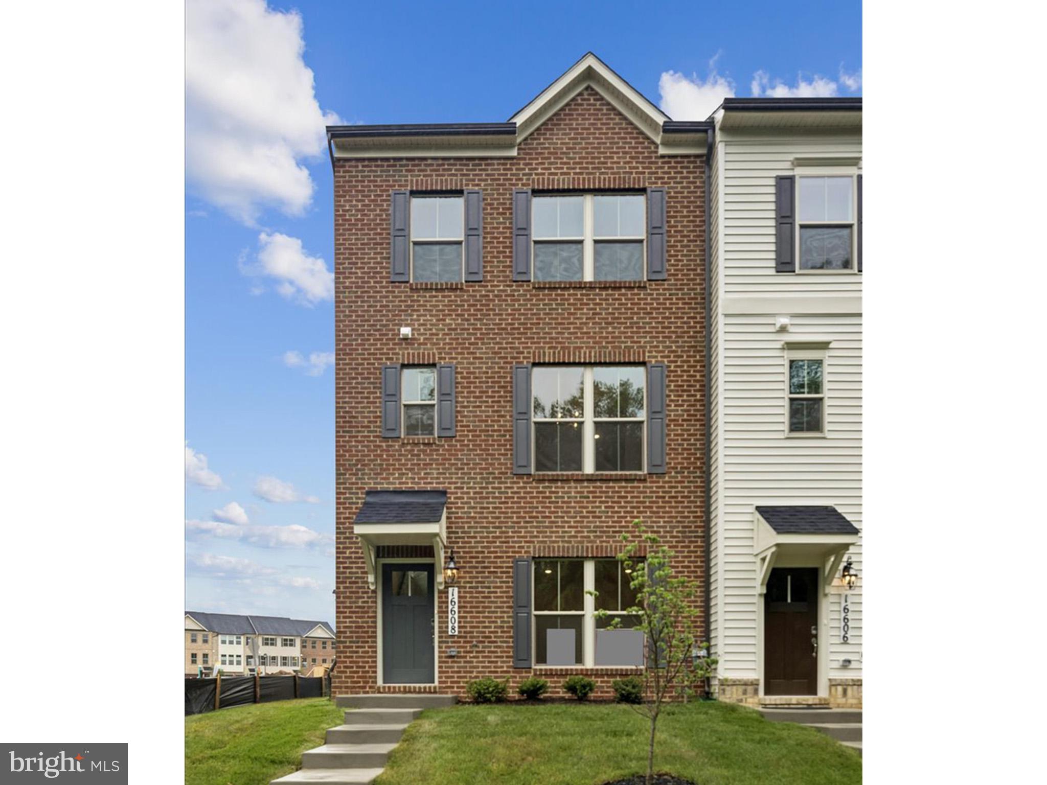 Welcome to this End-Unit Magothy floorplan at 16608 Breezeway Alley, located in Caruso Homes' Manning Square townhome community in Accokeek, Maryland., a modern townhome complete with a two-car rear load garage. The open-concept main level opens to the great room with built-in electric fireplace and features direct access to the expansive outdoor deck. The great room flows into the kitchen, which showcases upgraded stone countertops, stainless steel appliances, and a large center island. Upgraded hardwood flooring and elegant oak stairs add a refined touch throughout the home.

Upstairs, the primary suite offers an en-suite upgraded deluxe bathroom, which includes a freestanding tub and is completed by a walk-in closet. Two additional bedrooms, a full bathroom, and a convenient laundry area complete the upper level. The lower level includes an additional upgraded full bathroom. Oak starts and rails add an additional refined touch.

With energy-efficient features throughout and the assurance of a comprehensive builder warranty, this home offers exceptional comfort and value in Manning Square Towns.  Contact Caruso Homes for more information or a complete list of included features.