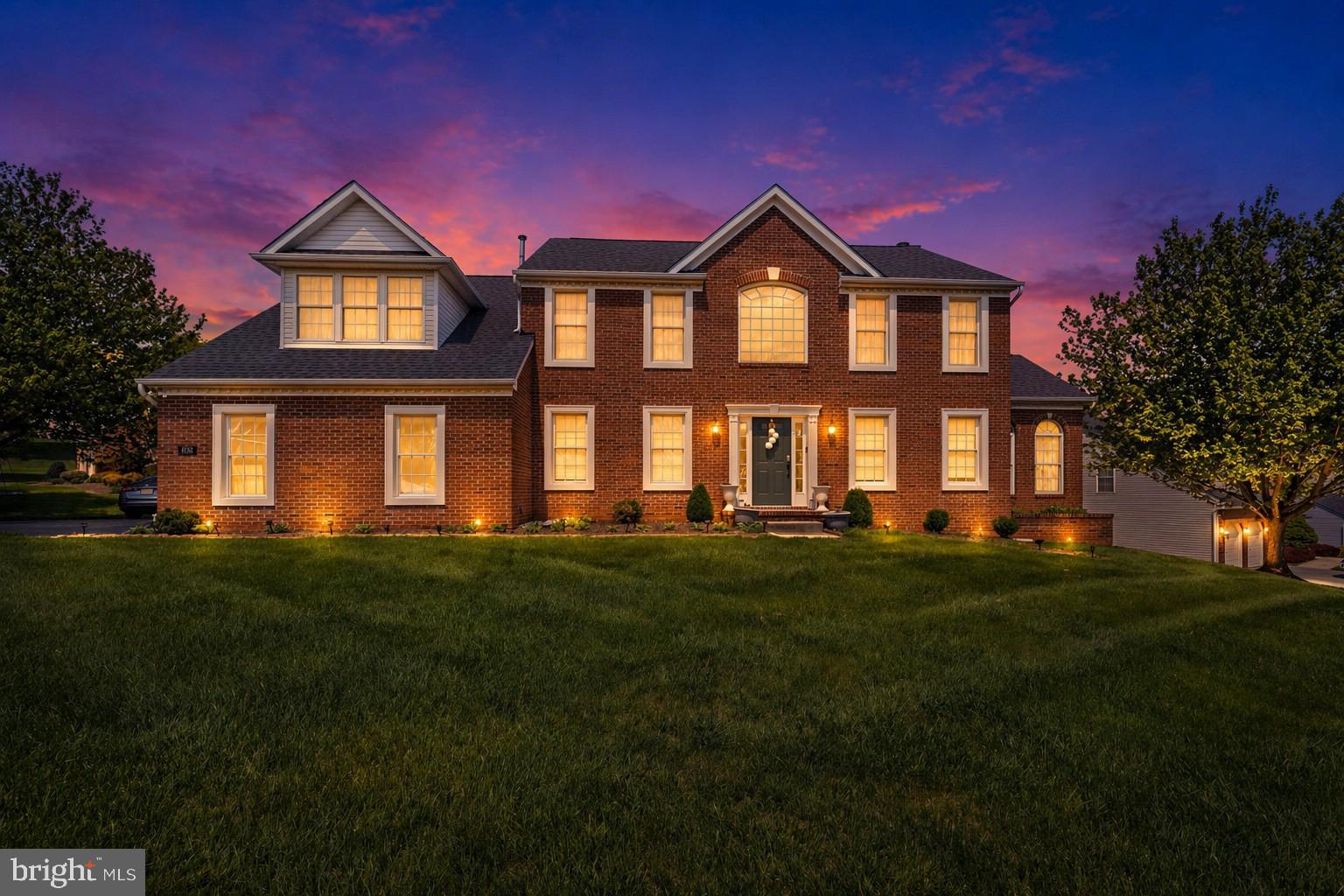 Welcome to a home that truly checks every box—space, style, and a layout designed for how you actually live. Homes with this combination of space, layout, and location don’t come around often—don’t miss it. Expansive, thoughtfully laid out, and designed for both everyday comfort and elevated entertaining, this 4-bedroom, 3.5-bath Colonial delivers the space and presence today’s buyers are looking for. The main level is anchored by a well-appointed kitchen featuring stainless steel appliances and a center island, seamlessly opening to a spacious great room—creating a natural hub for gatherings, conversation, and connection. Just beyond, formal living and dining rooms provide a refined setting for hosting, holidays, and special occasions. A standout feature of the home is the sun-drenched bonus room, where walls of natural light and serene backyard views create a space that feels both inspiring and calming—perfect for a private office, lounge, or creative retreat. Upstairs, the primary suite offers a true sense of retreat, complete with a sitting area and generous closet space, delivering both comfort and functionality. Outdoor living is just as inviting, with a large deck overlooking a flat, open backyard—ideal for entertaining, relaxing, or enjoying quiet evenings at home. A side-load garage, ample parking, and a highly convenient location near major commuter routes add to the home’s overall appeal—offering both accessibility and a sense of privacy.
