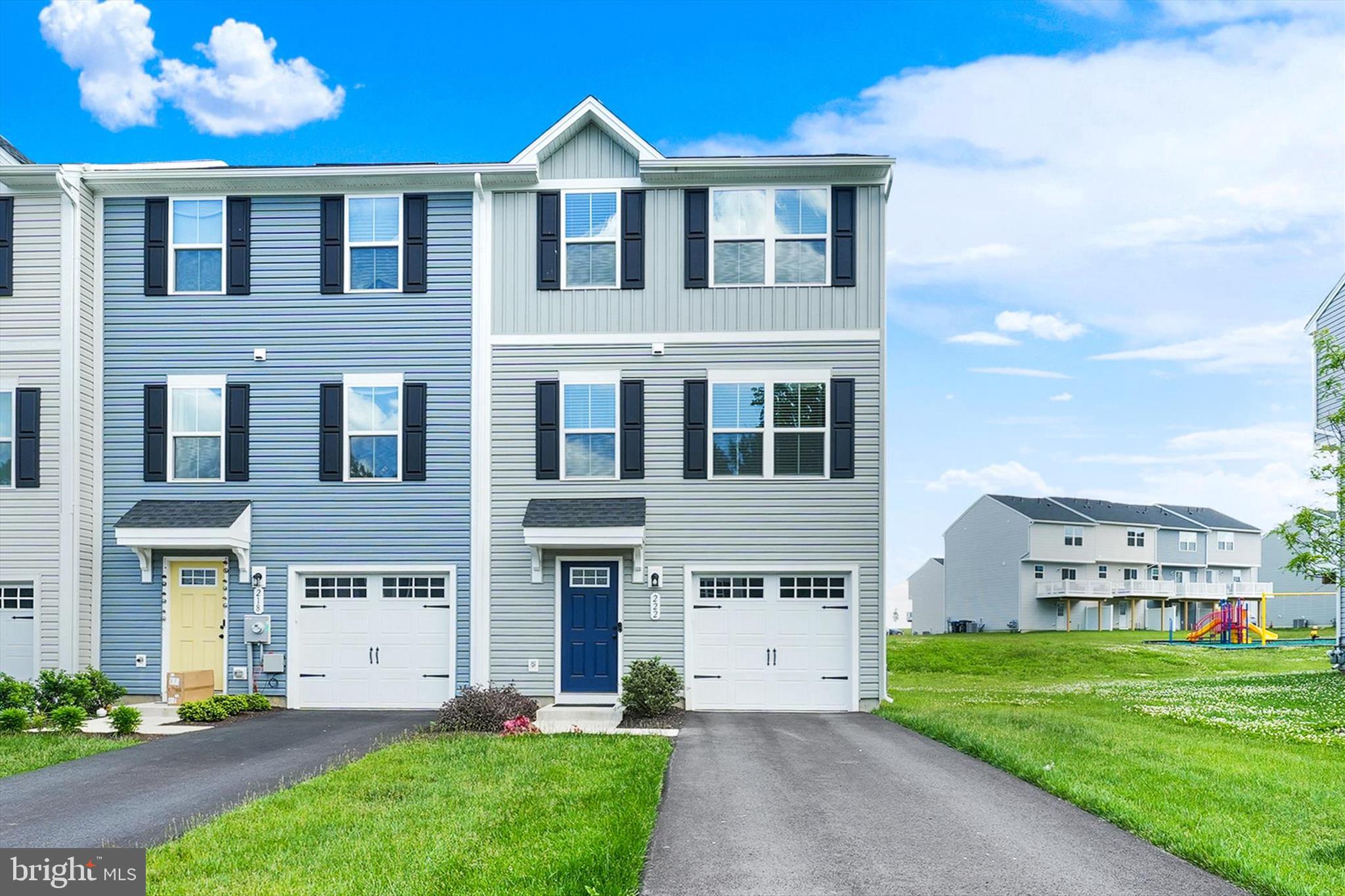 Why wait for new construction when you can have it all right now? ✨

Welcome to 222 Hamilton Lane, a beautifully upgraded end-unit townhome in the desirable Valley Square Towns community. Built in 2024, everything is practically brand new, giving you the peace of mind and modern finishes of new construction without the wait.

With 3 bedrooms, 2.5 bathrooms, a one-car garage, and a flexible floor plan, this home checks all the boxes. The entry level features a versatile flex space perfect for a home office, gym, playroom, or second living area, with direct access to the backyard.

The main living level is bright, open, and ideal for entertaining. Thanks to the additional windows that come with an end-unit location, natural light pours into the space throughout the day. The stunning white kitchen features stone countertops, stainless steel appliances, and ample cabinetry, while the adjoining dining area opens to a beautiful deck that expands your living space outdoors. A conveniently located powder room on this level adds extra functionality for guests and everyday living.

Upstairs, the spacious primary suite offers a large walk-in closet and private bathroom. Two additional bedrooms, a full hall bath, and second-floor laundry complete the upper level.

Additional upgrades include luxury vinyl plank flooring, recessed lighting throughout, and ceiling fan rough-ins, making future customization easy.

Located just steps from the community tot lot and playground, this home enjoys one of the most convenient locations in the neighborhood. Plus, you're only minutes from shopping, restaurants, and Route 30 for an easy commute.

Built in 2024 and move-in ready, 222 Hamilton Lane offers the rare opportunity to enjoy a like-new home with modern finishes, thoughtful upgrades, and a fantastic location. All that's left to do is unpack and enjoy.