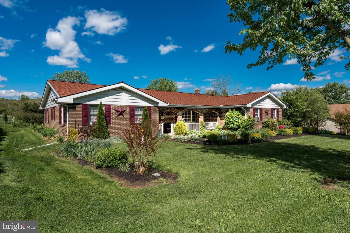 Beautiful custom built brick rancher on almost an acre of land. 50 year roof, new spouting & windows. Spacious bedrooms, 1st floor laundry and an oversized 2 car garage. This home is also equipped with a back up, 5 second generator. Custom Levolon blinds and window treatments. Property backs up to preserved farm land.