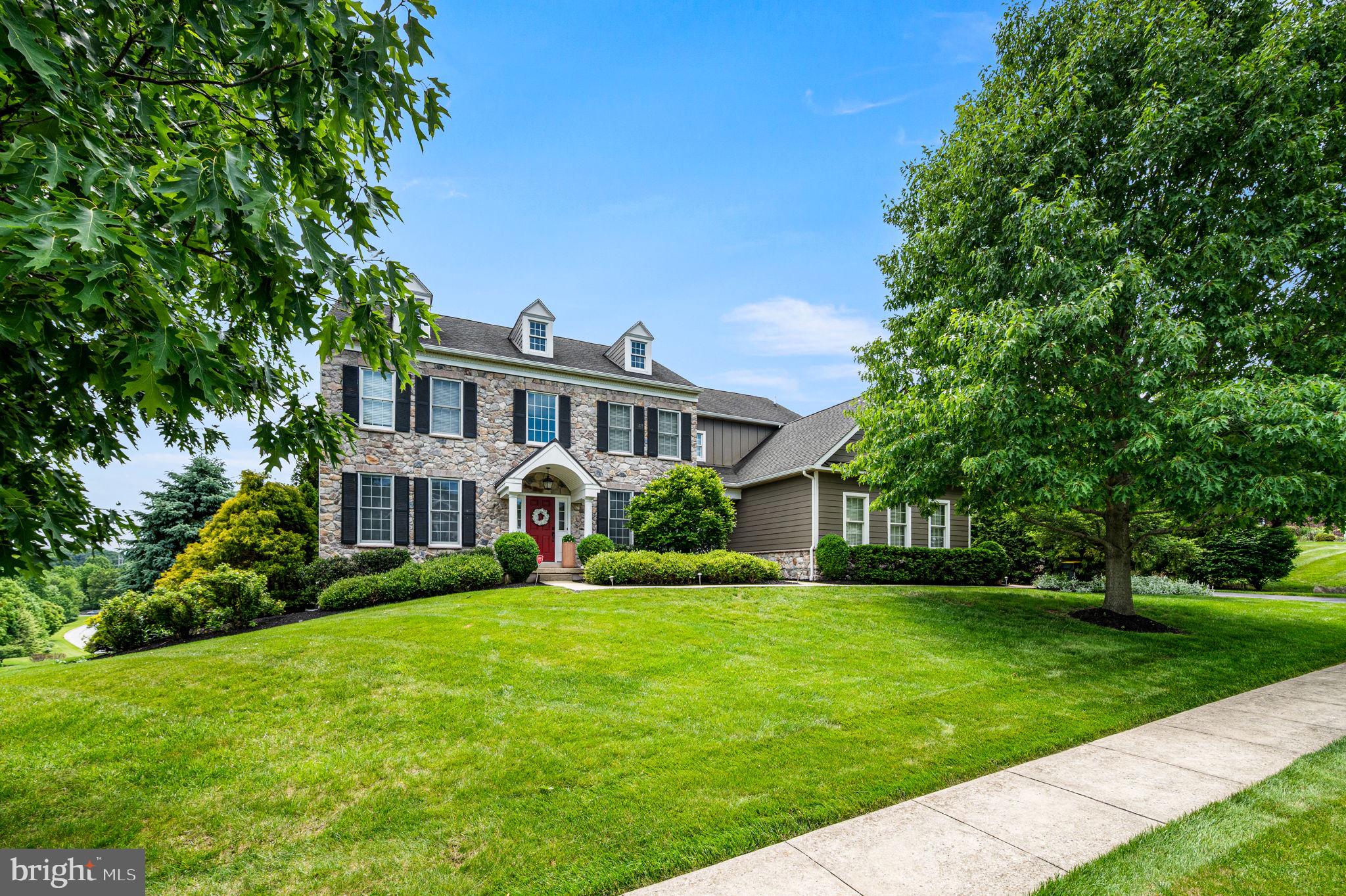 Experience the pinnacle of sophisticated living in this magnificent executive home.  Spanning over  5000 square feet of meticulously planned design, this home offers an exqusite lifestyle tailored for bith grand entertaining and intimate family moments.  The gourmet chef's kitchen features a center island, pantry, tons of cabinet space and granite countertops plus breakfast area.   The enormous family room has a stone fireplace as the focal point, and  accesses the large deck, creating  an amazing space for family movie night and entertaining.   The first floor private office is an added bonus.  In addition, the living room and dining rooms just add a more formal area for entertaining.  There is a separate mudroom entrance which provides the perfect landing point for shoes and book bags.  From the  elegant front stairway ascend to the breathtaking  primary retreat complete with a spa-like ensuite, large sitting room and fantastic walk-in closets.  Two bedrooms with jack-n jill bathroom plus a  princess suite complete the second floor living space.  There is more: . Below, the walk-out lower level transforms into a private resort, boasting a full bar and home gym that open directly onto a masterfully landscaped terrace and custom patio.  A storage room plus powder room  complete the space.  Experience luxury and comfort at its finest.”   This home is a must to add to your house tour - you wont be disappointed.   Make your appoitment today and make this amazing house the place to call home!