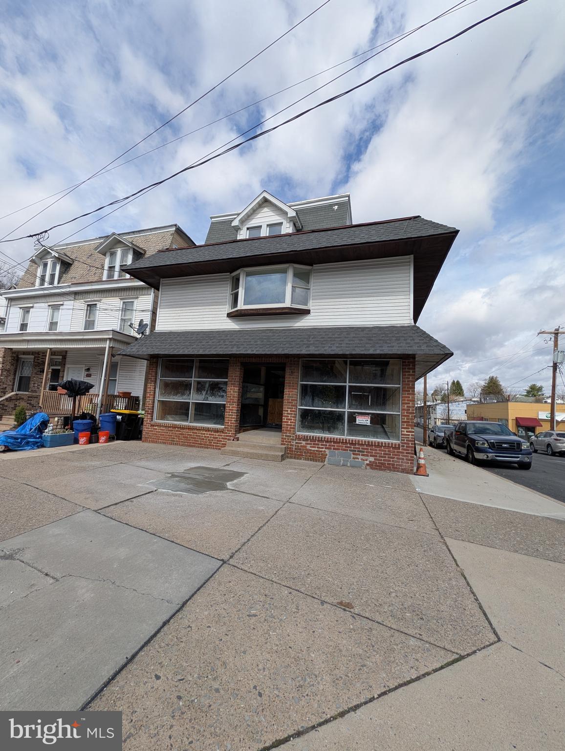 The possibilities are numerous for this HUGE commercial and residential property with approximately 24000 sq ft in the desirable neighborhood of Yorkville.  Location is a highly visible trafficked area.  New roofs and updated electrical have been completed.  The first floor is the entire length from Market to West End Ave.  Originally a retail space but so much potential. New office area and large half bath added.  The building has 3 separate areas on the first floor.  Three apartments are ready for occupancy.  There are two 2 bedroom and a 3rd floor 1 bedroom.  These have separate entrance from the outside.  There is the possibility for 2 or 3 more residential units in the back upper level.  The basement is also the entire footprint of the building.  There are 2 garage entrances from West End Ave.   That space itself is spacious.  Check with Pottsville zoning for all potential uses.  This is a must see to appreciate.